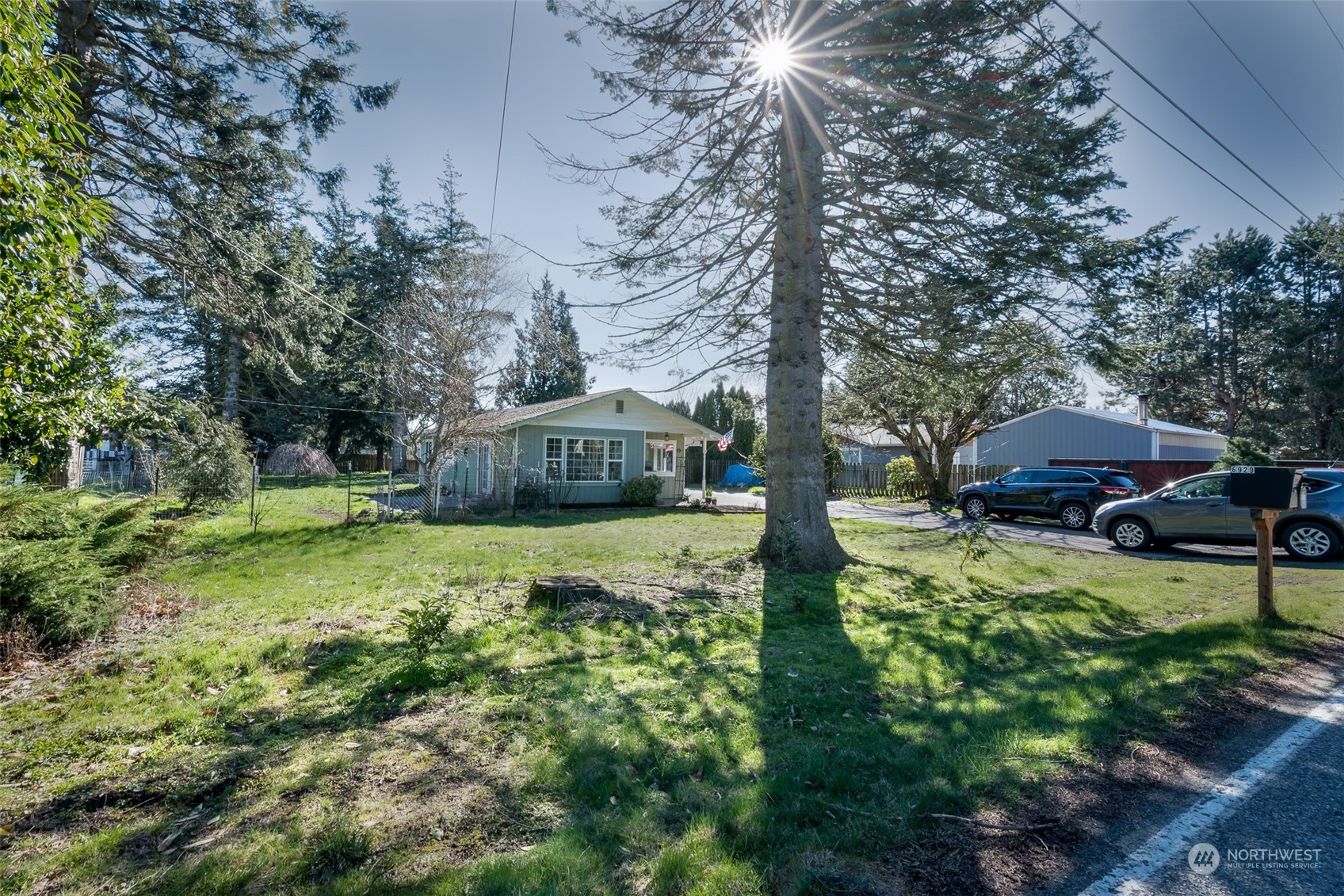 6912 Old Guide Road Lynden, WA 98264 - Photo 30 of 37 a view of a garden with large trees