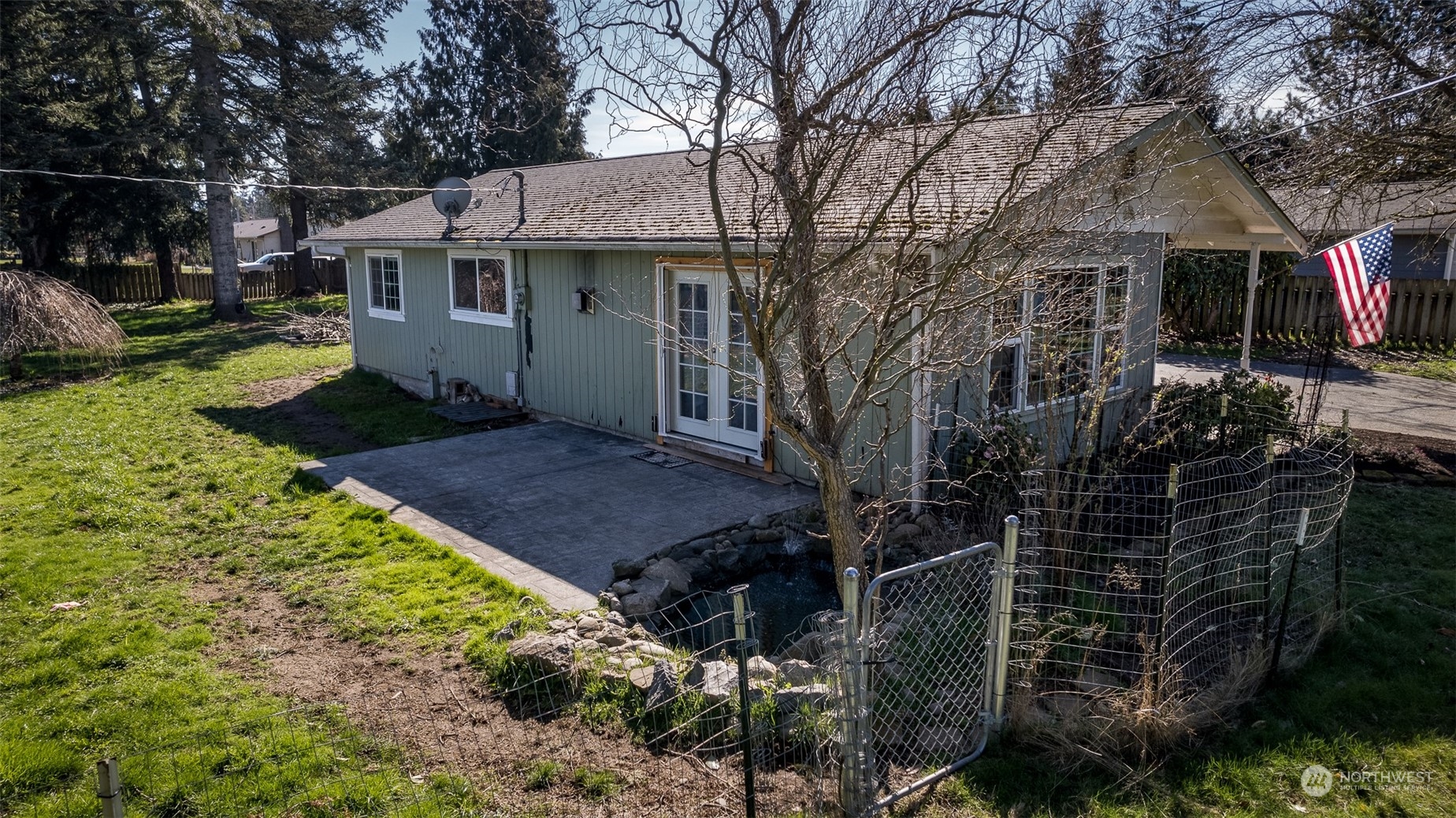 6912 Old Guide Road Lynden, WA 98264 - Photo 36 of 37 a view of a house with a yard and tree s