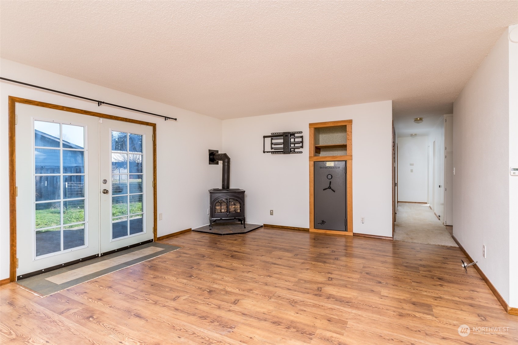 6912 Old Guide Road Lynden, WA 98264 - Photo 4 of 37 a view of a livingroom with wooden floor and furniture