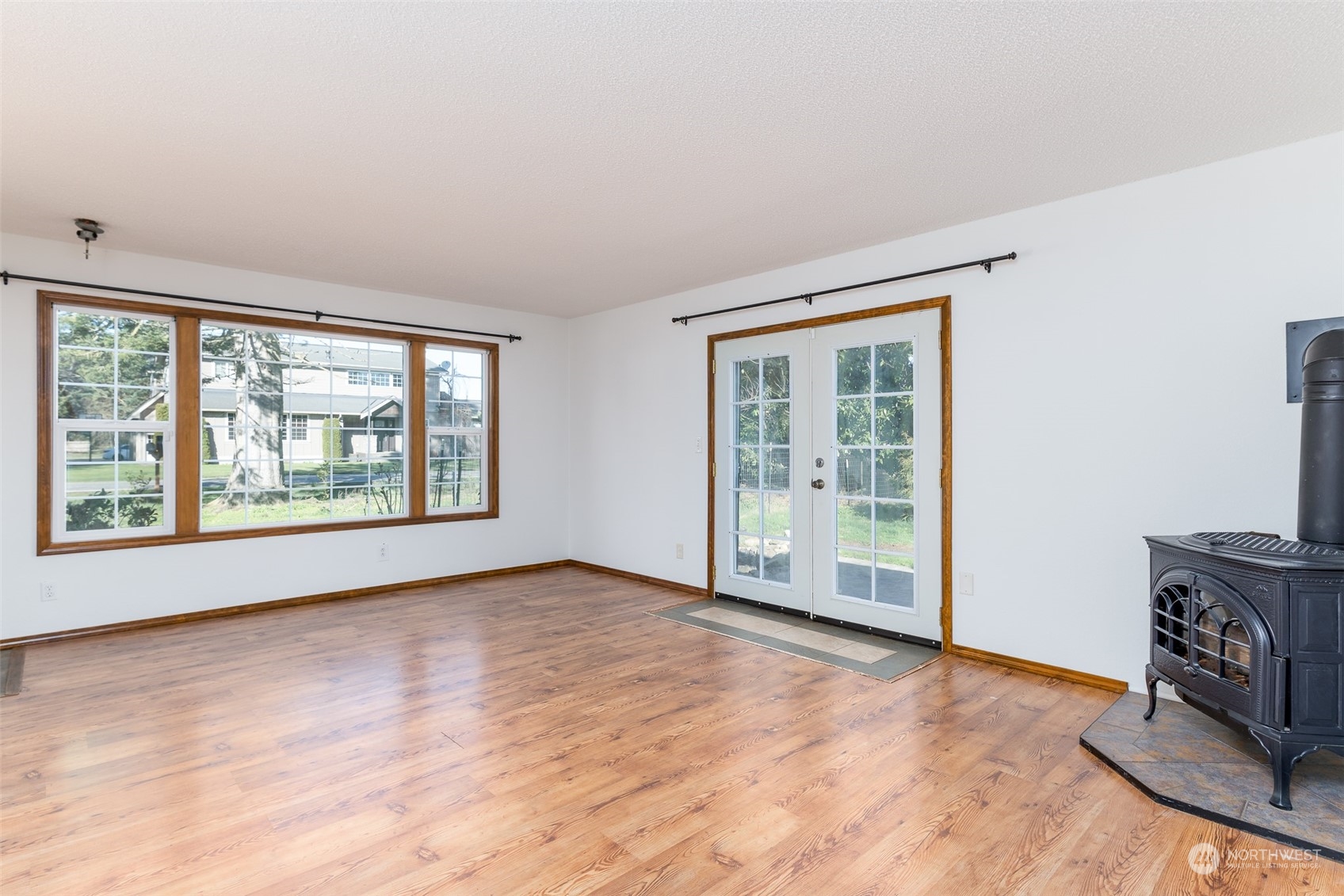 6912 Old Guide Road Lynden, WA 98264 - Photo 5 of 37 a view of an empty room with a window and a kitchen