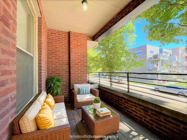 a kitchen with stainless steel appliances granite countertop a stove a refrigerator and a microwave