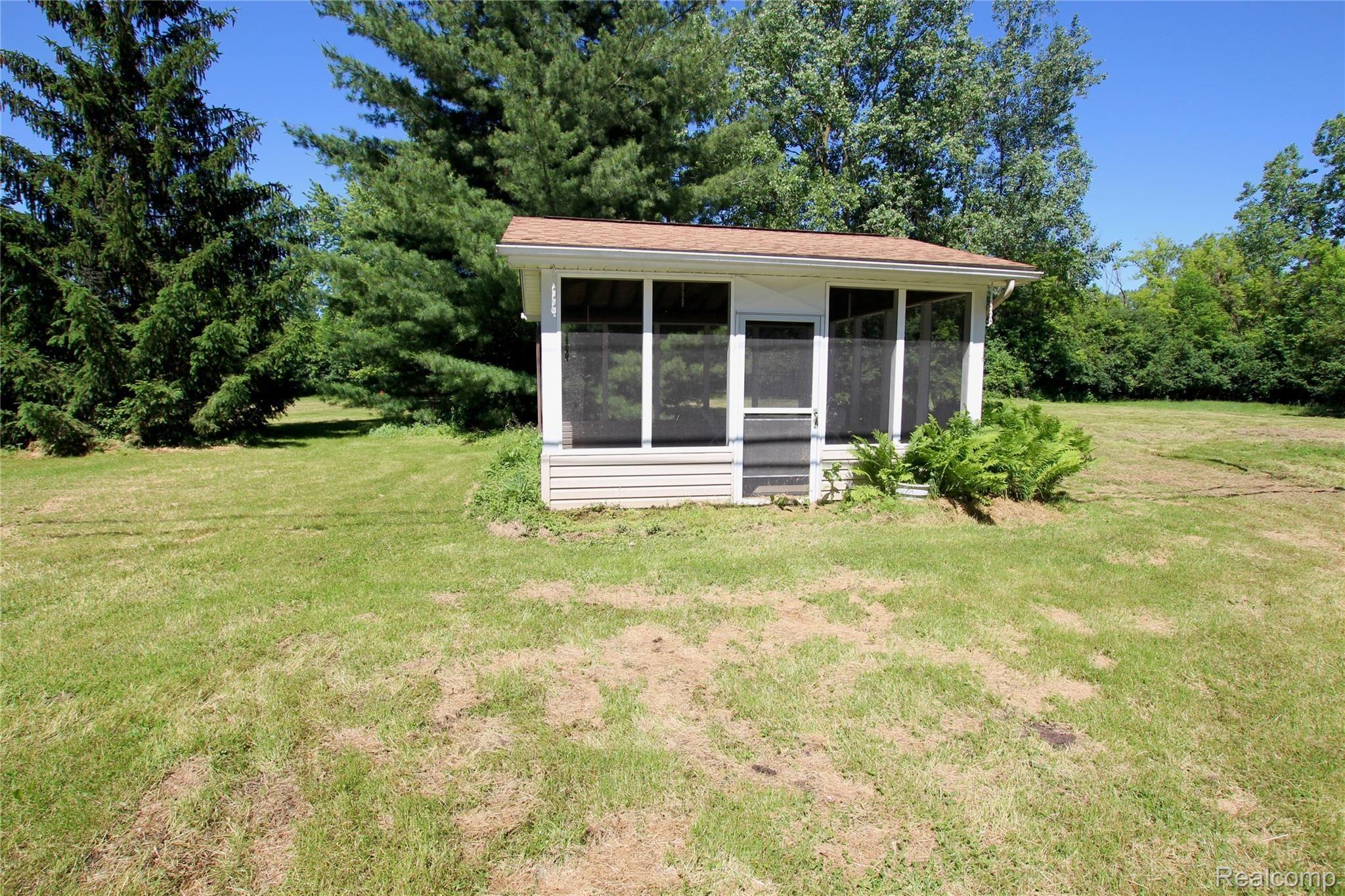 20975 Metroview Road Farmington, MI 48335 - Photo 15 of 22 20975-metroview-screened-porch2.jpg