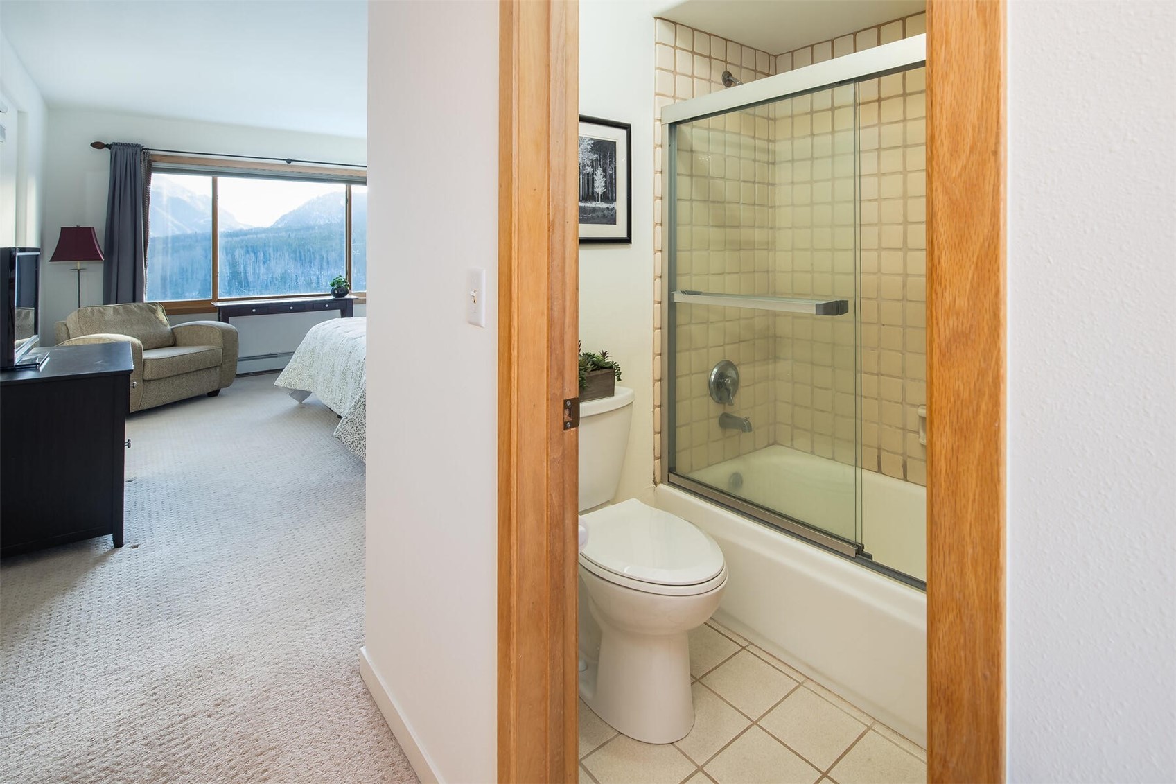 95600 Ryan Gulch Road, Unit 631 Silverthorne, CO 80498 - Photo 19 of 44 a bathroom with a shower toilet and sink