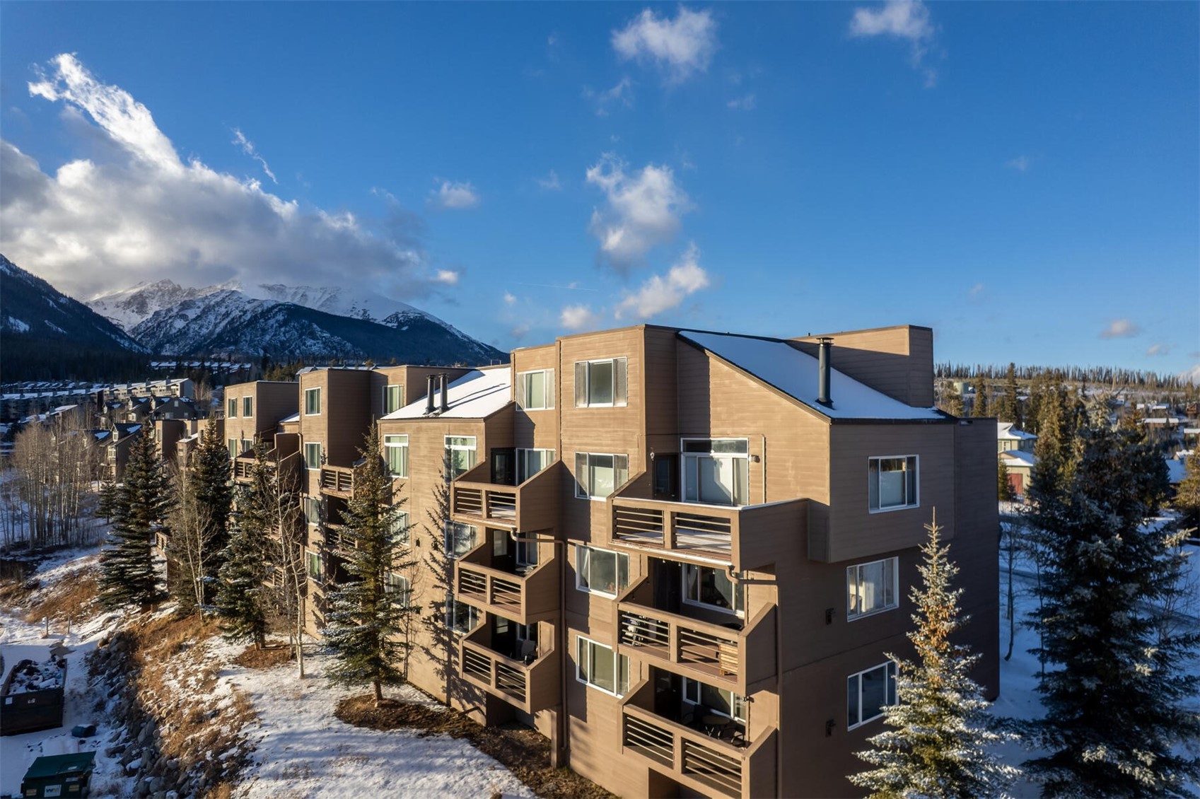 95600 Ryan Gulch Road, Unit 631 Silverthorne, CO 80498 - Photo 28 of 44 a city view with tall buildings