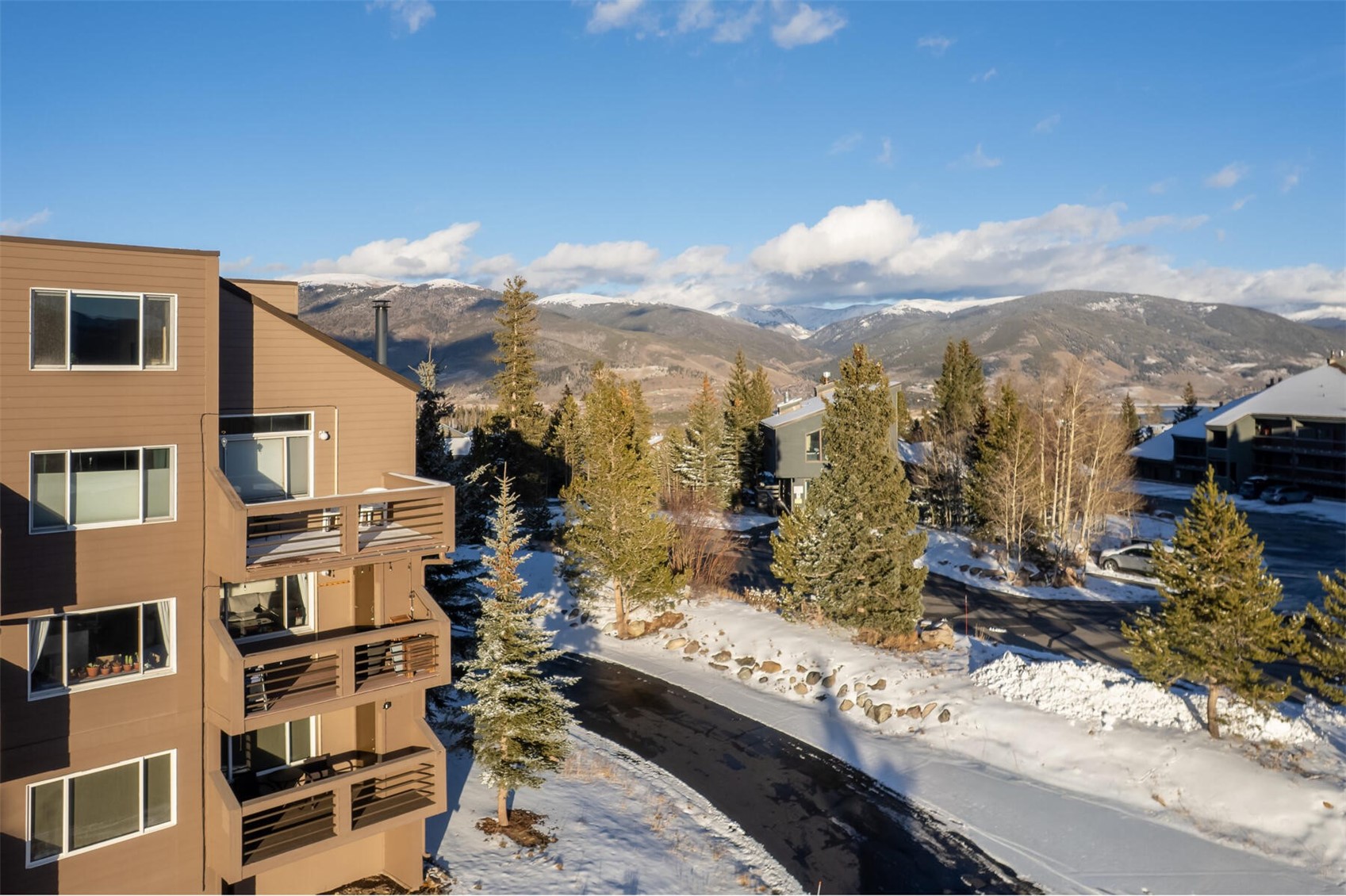 95600 Ryan Gulch Road, Unit 631 Silverthorne, CO 80498 - Photo 29 of 44 a view of a city with tall buildings