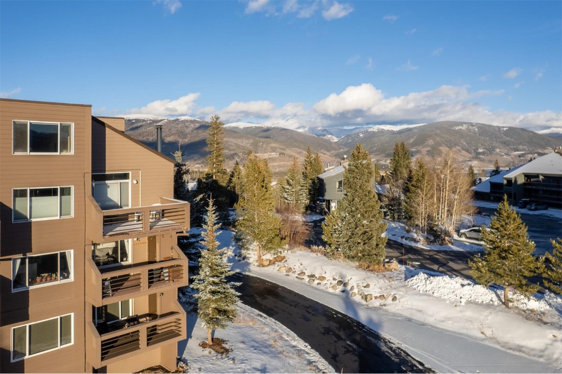 95600 Ryan Gulch Road, Unit 631 Silverthorne, CO 80498 - Photo 29 of 44 a view of a city with tall buildings