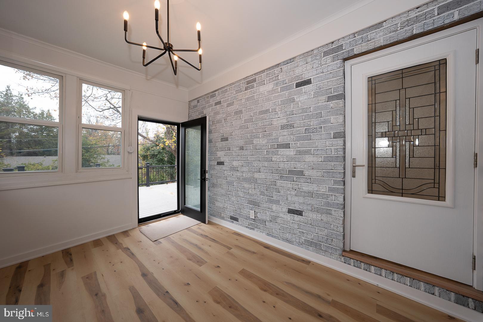 115 David Road Bala Cynwyd, PA 19004 - Photo 23 of 56 View of Sunroom to deck. Custom doors.