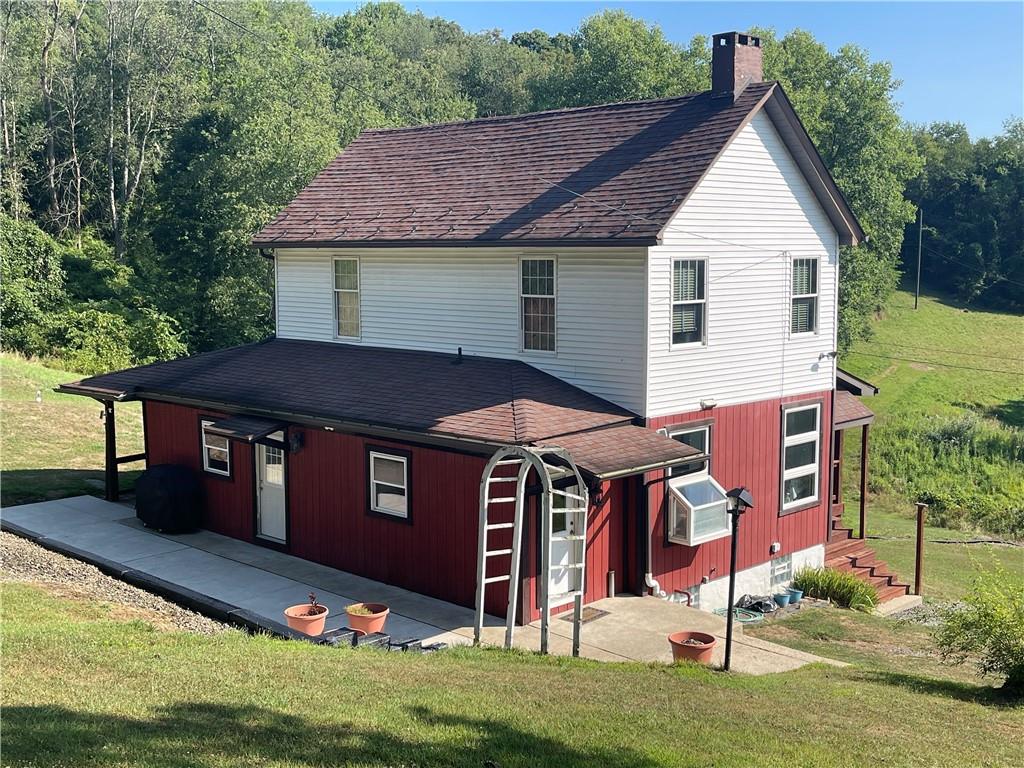 489 Jack Road Vandergrift, PA 15690 - Photo 5 of 46 a front view of a house with garden