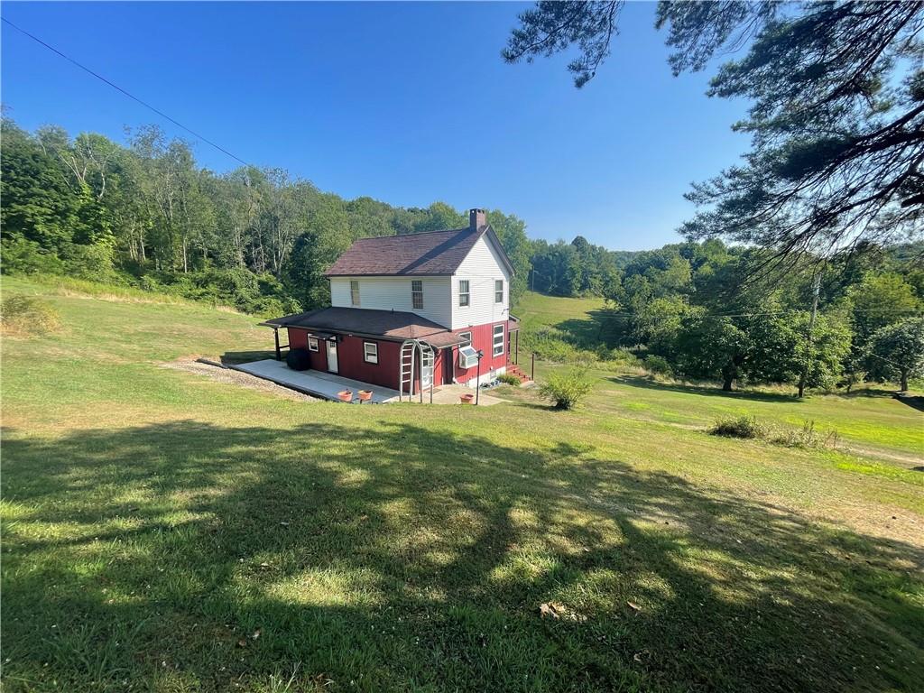 489 Jack Road Vandergrift, PA 15690 - Photo 6 of 46 a view of a house with a big yard