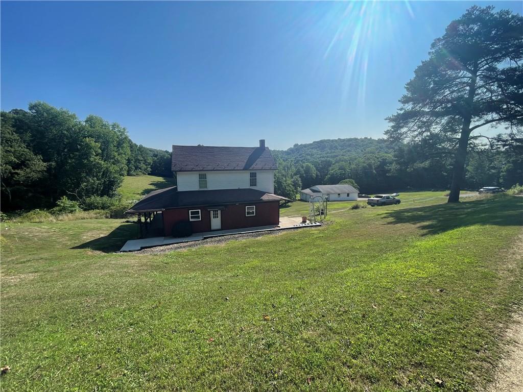 489 Jack Road Vandergrift, PA 15690 - Photo 7 of 46 a view of a house with a big yard