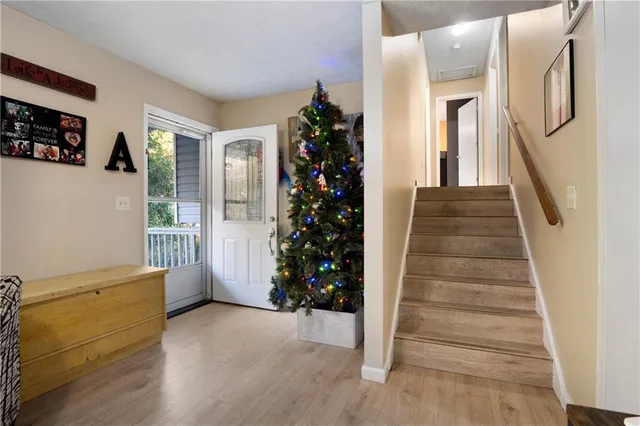 a view of entryway with stairs