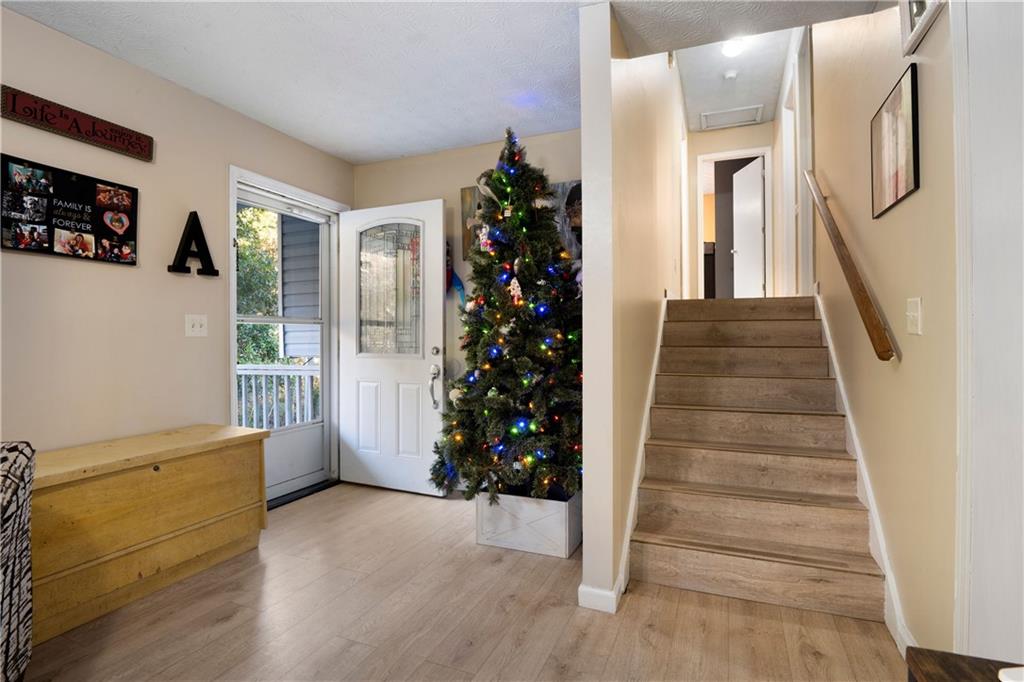 988 Davenport Road Southwest Dalton, GA 30721 - Photo 11 of 29 a view of entryway with stairs