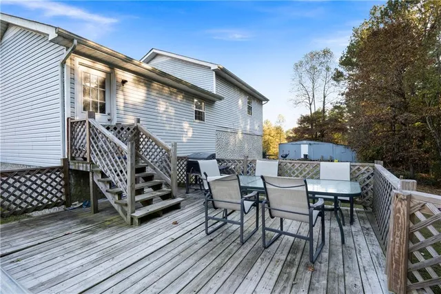 a view of a chairs on the deck