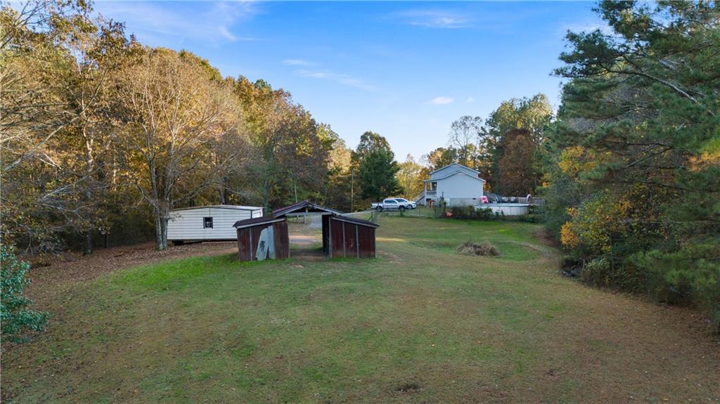 988 Davenport Road Southwest Dalton, GA 30721 - Photo 29 of 29 a view of a house with backyard