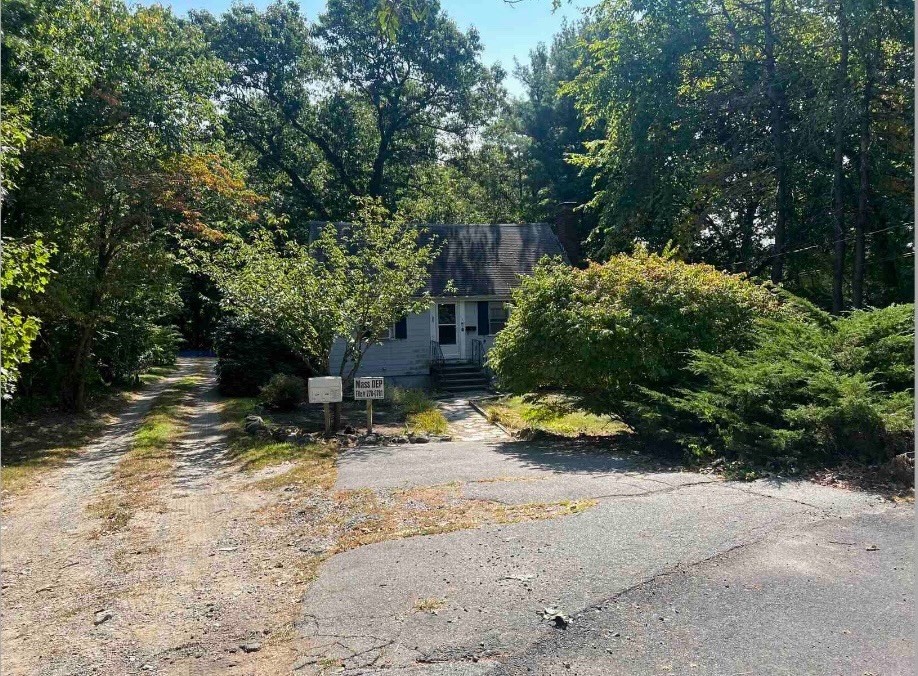 246 Walnut Street Reading, MA 01867 - Photo 2 of 2 a view of backyard with swimming pool and sitting area