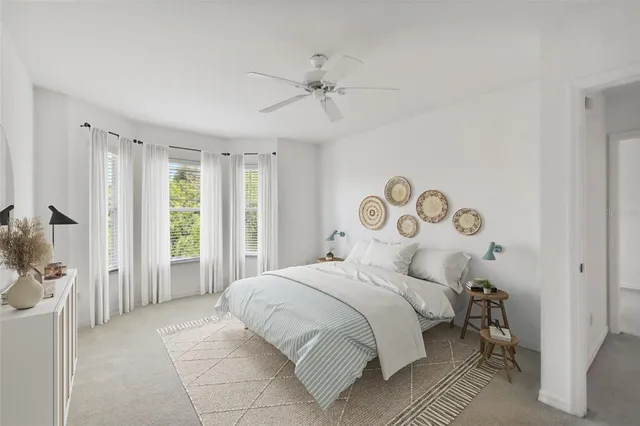 a bathroom with a sink toilet tub and shower