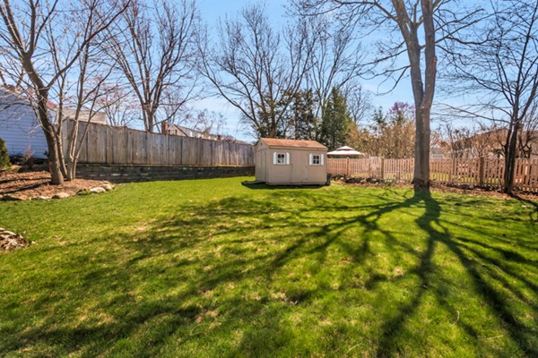 11 Melo Road Woburn, MA 01801 - Photo 20 of 22 a view of a house with a yard