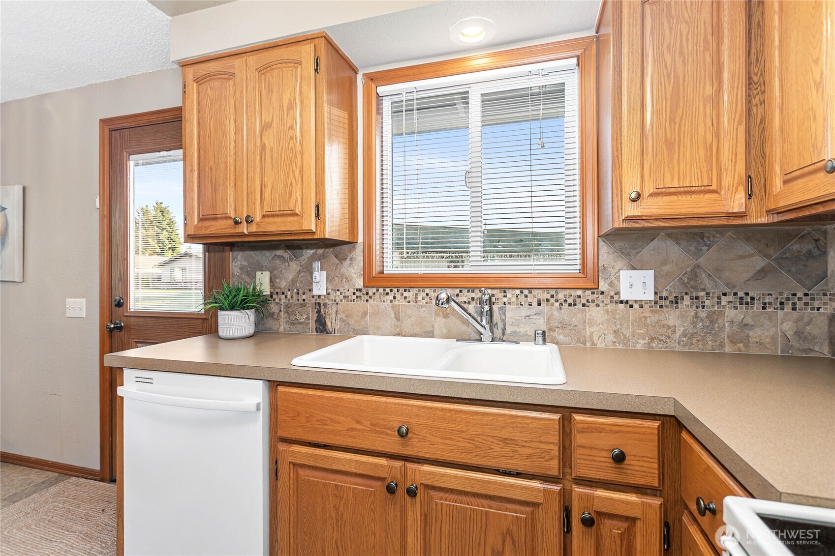 508 Forest Circle, Unit 4A Lynden, WA 98264 - Photo 16 of 25 a bathroom with a sink and a window