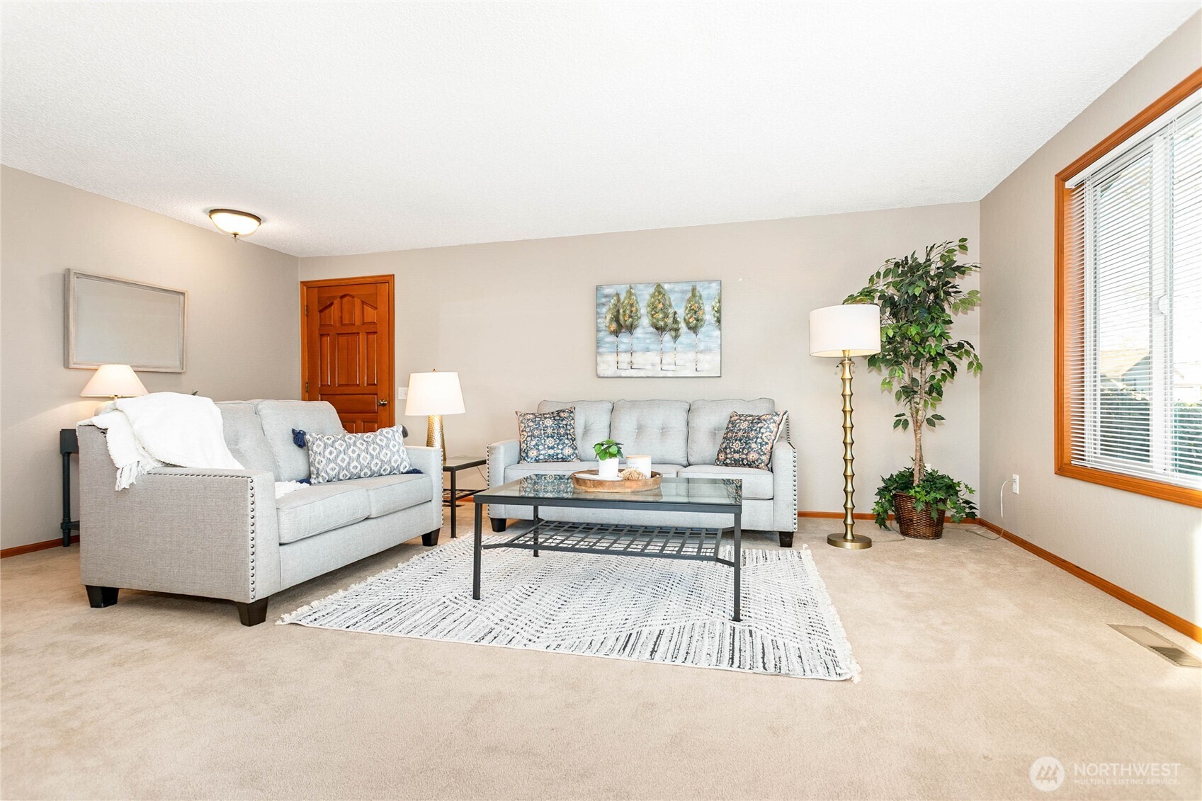 508 Forest Circle, Unit 4A Lynden, WA 98264 - Photo 7 of 25 a living room with furniture and a potted plant