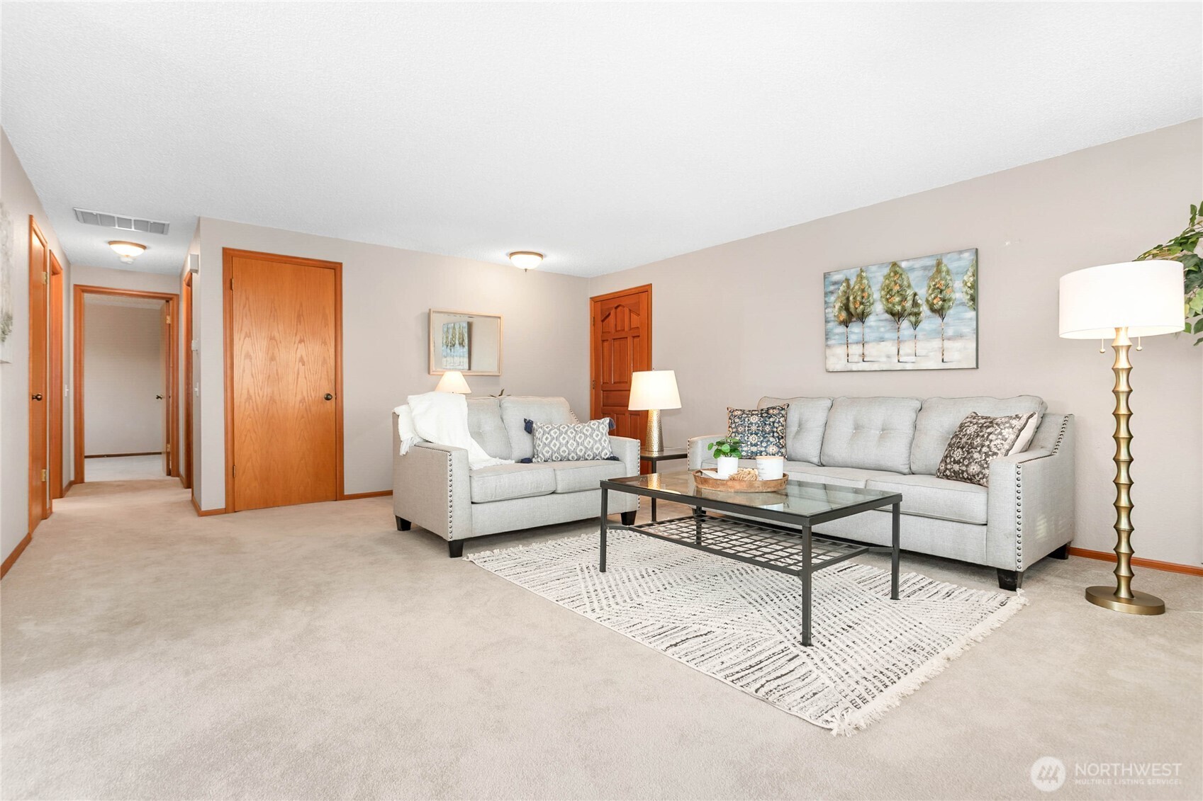 508 Forest Circle, Unit 4A Lynden, WA 98264 - Photo 8 of 25 a living room with furniture and a lamp