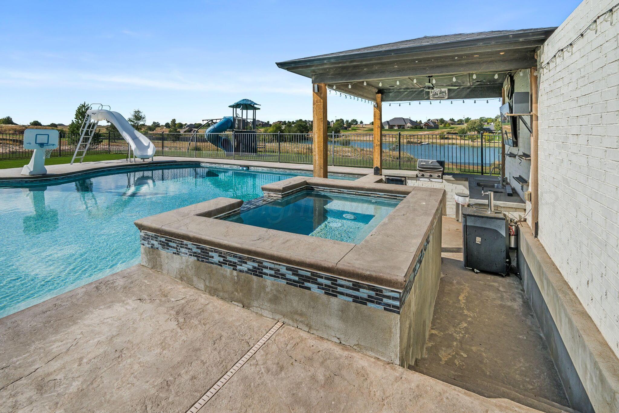 17400 Spring Lake Drive Canyon, TX 79015 - Photo 38 of 52 a view of a swimming pool with a patio