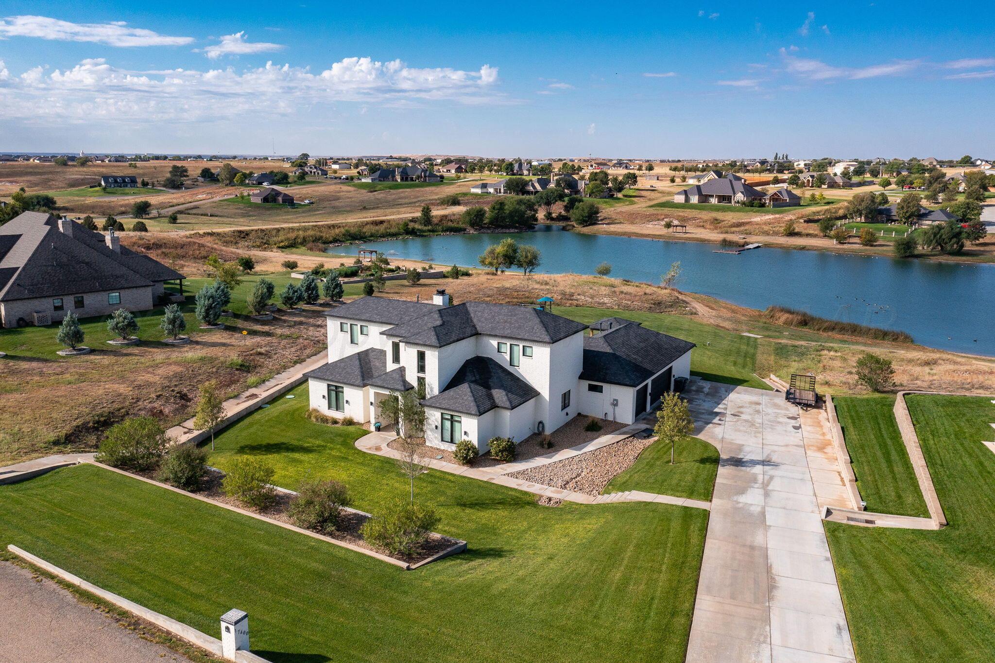 17400 Spring Lake Drive Canyon, TX 79015 - Photo 42 of 52 a view of a lake with a city