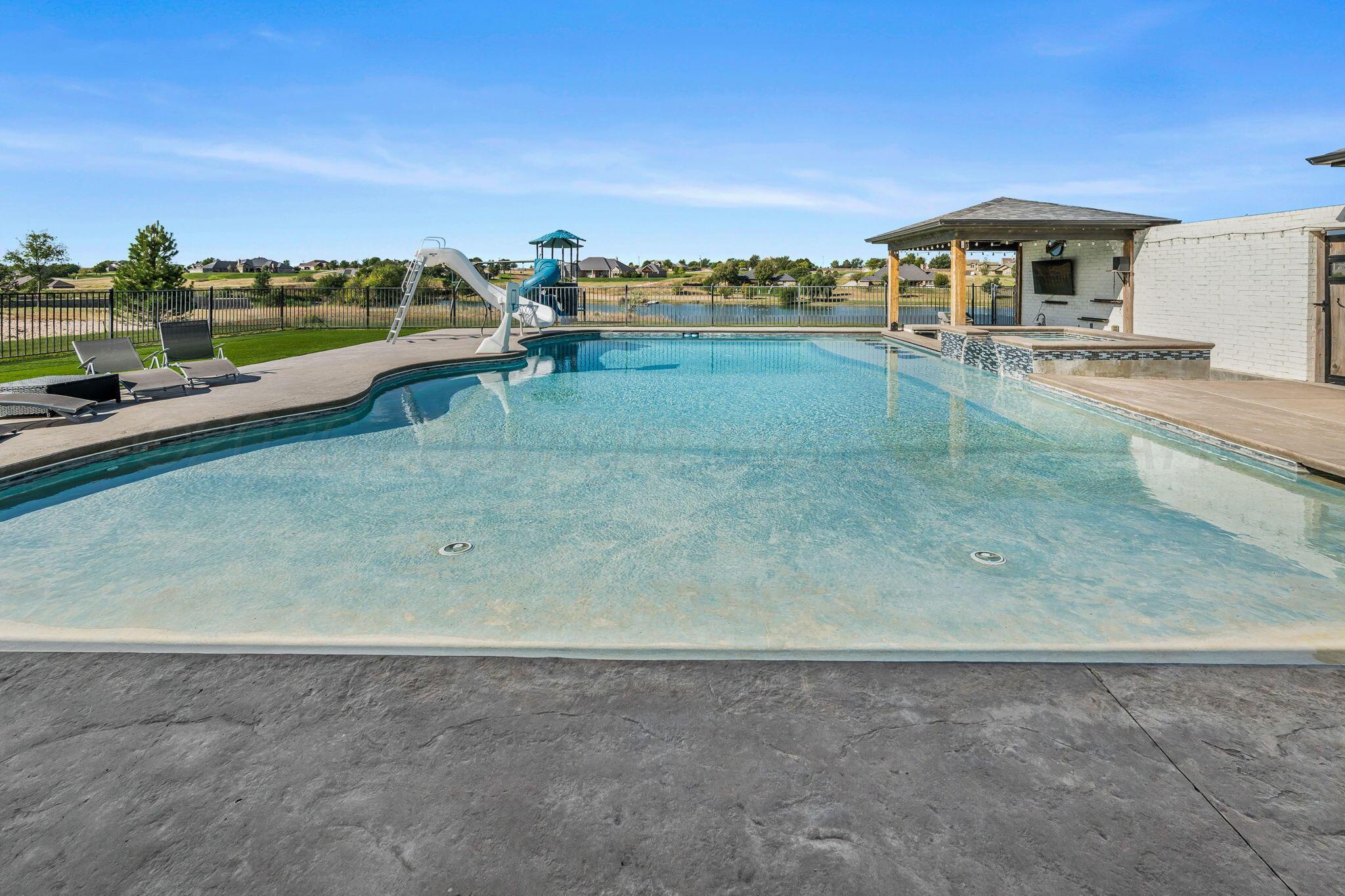 17400 Spring Lake Drive Canyon, TX 79015 - Photo 49 of 52 a view of a terrace with a garden and mountain view