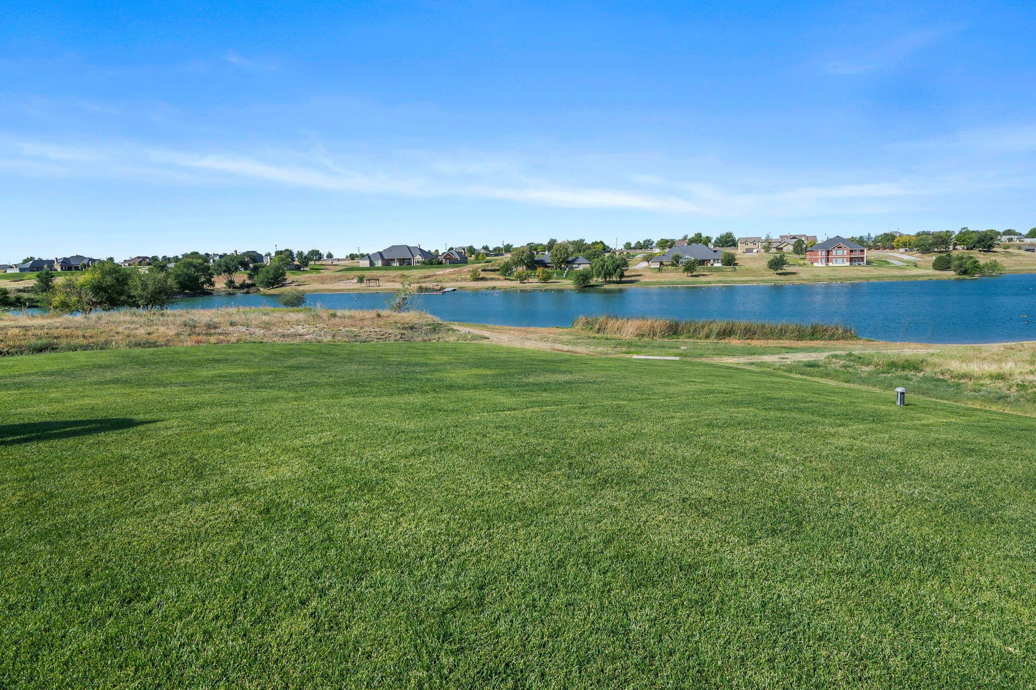 17400 Spring Lake Drive Canyon, TX 79015 - Photo 52 of 52 a view of a lake with houses in the back