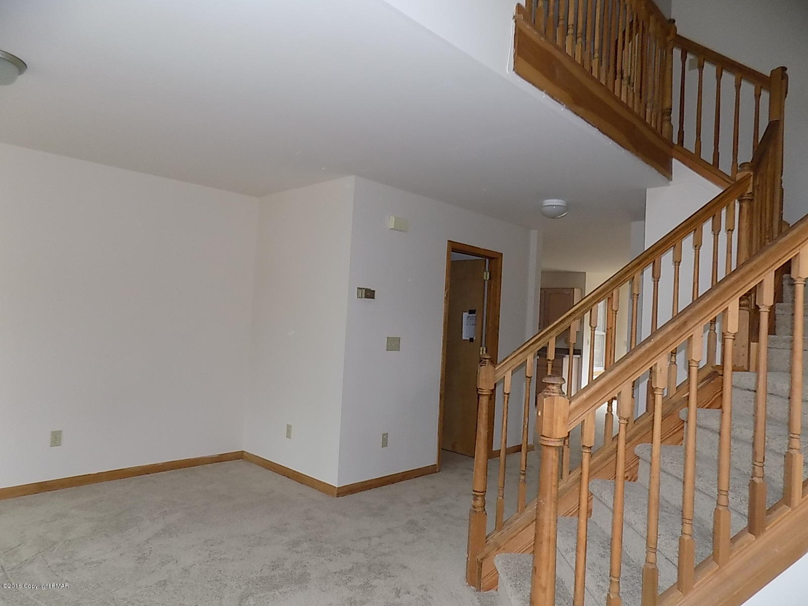 266 Oneida Way Milford, PA 18337 - Photo 16 of 22 a view of an entryway with staircase