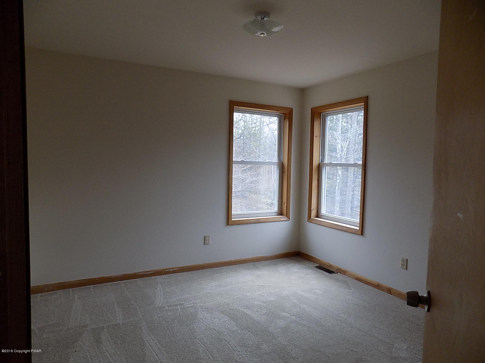 266 Oneida Way Milford, PA 18337 - Photo 18 of 22 an empty room with windows