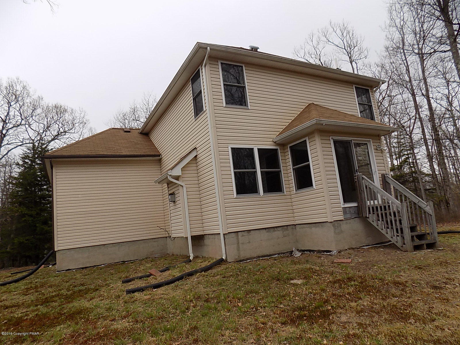 266 Oneida Way Milford, PA 18337 - Photo 3 of 22 a view of a house with backyard