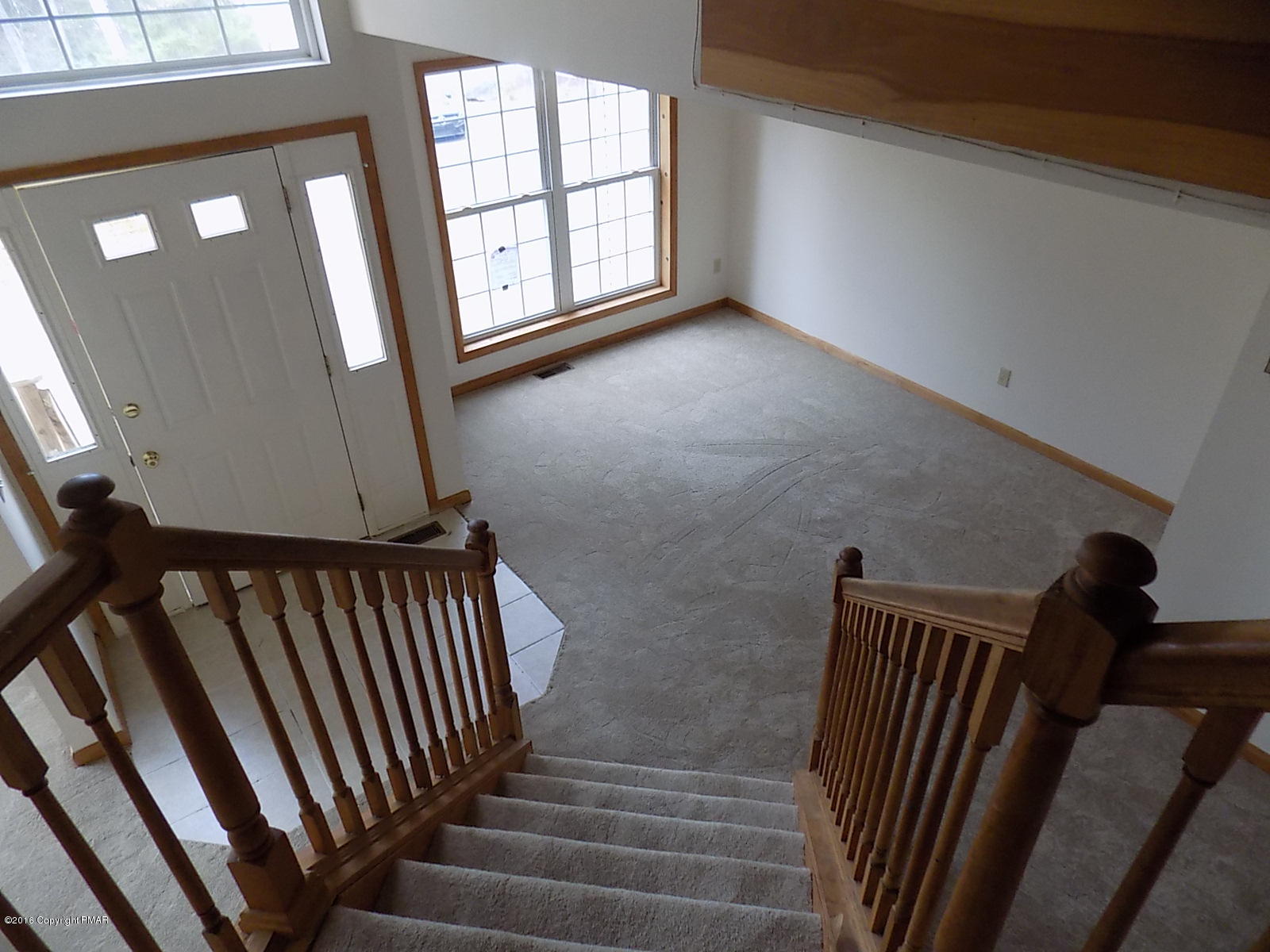 266 Oneida Way Milford, PA 18337 - Photo 6 of 22 a view of an entryway with wooden floor
