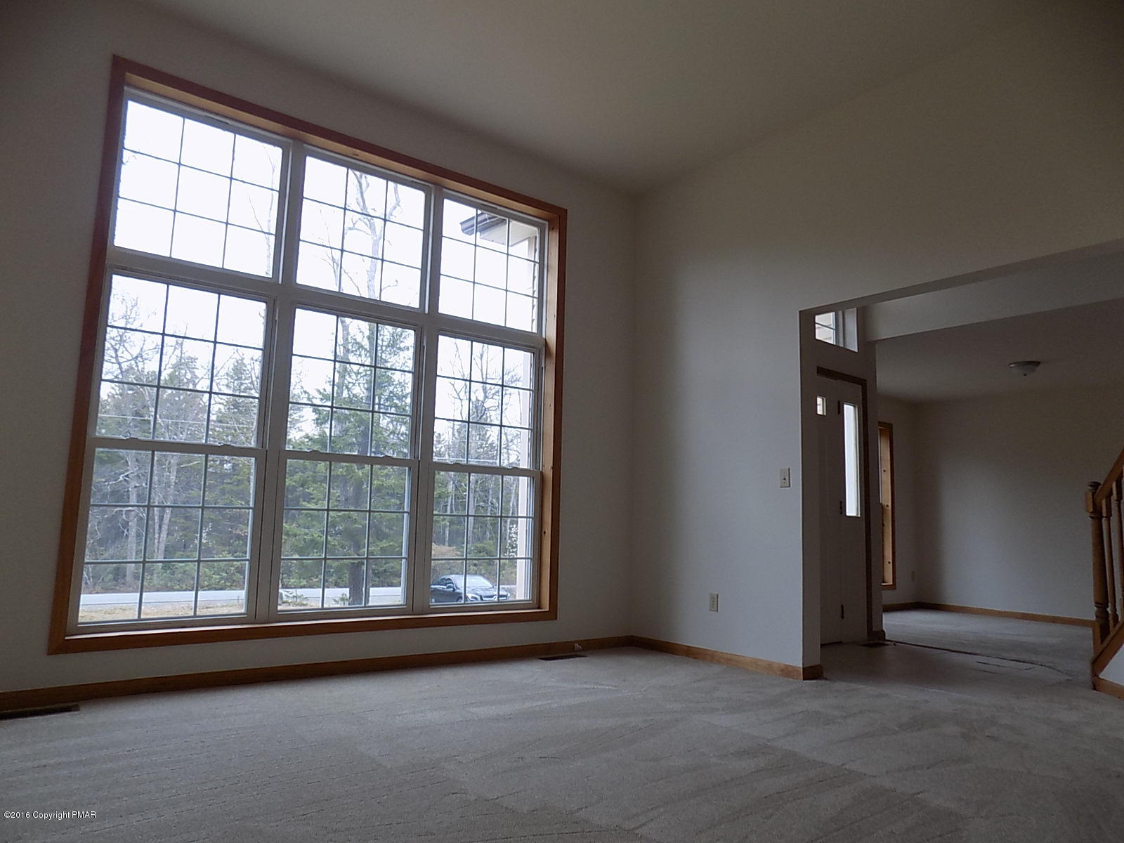 266 Oneida Way Milford, PA 18337 - Photo 9 of 22 a view of empty room with floor to ceiling window