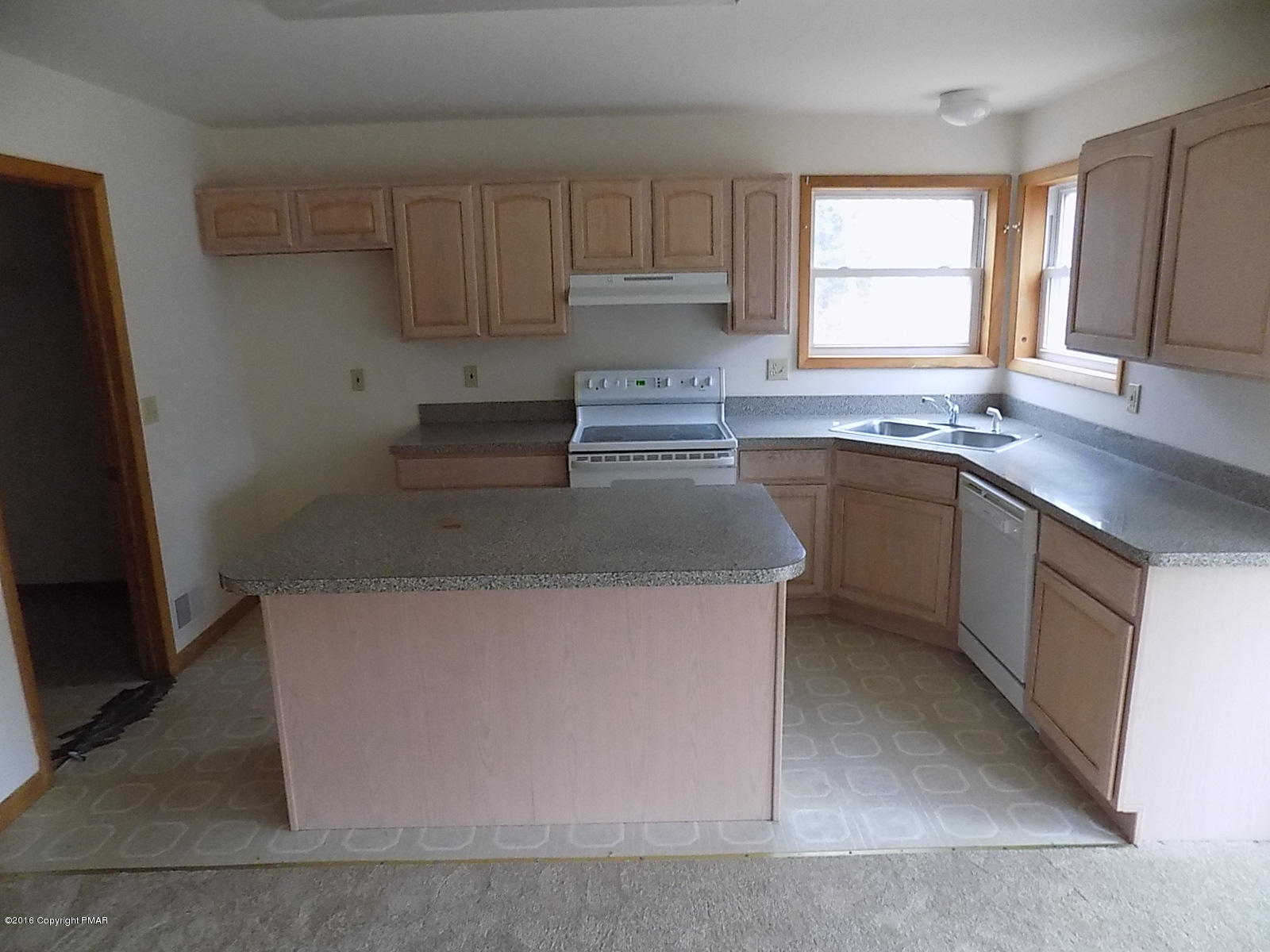 266 Oneida Way Milford, PA 18337 - Photo 10 of 22 a kitchen with stainless steel appliances granite countertop a sink stove and microwave