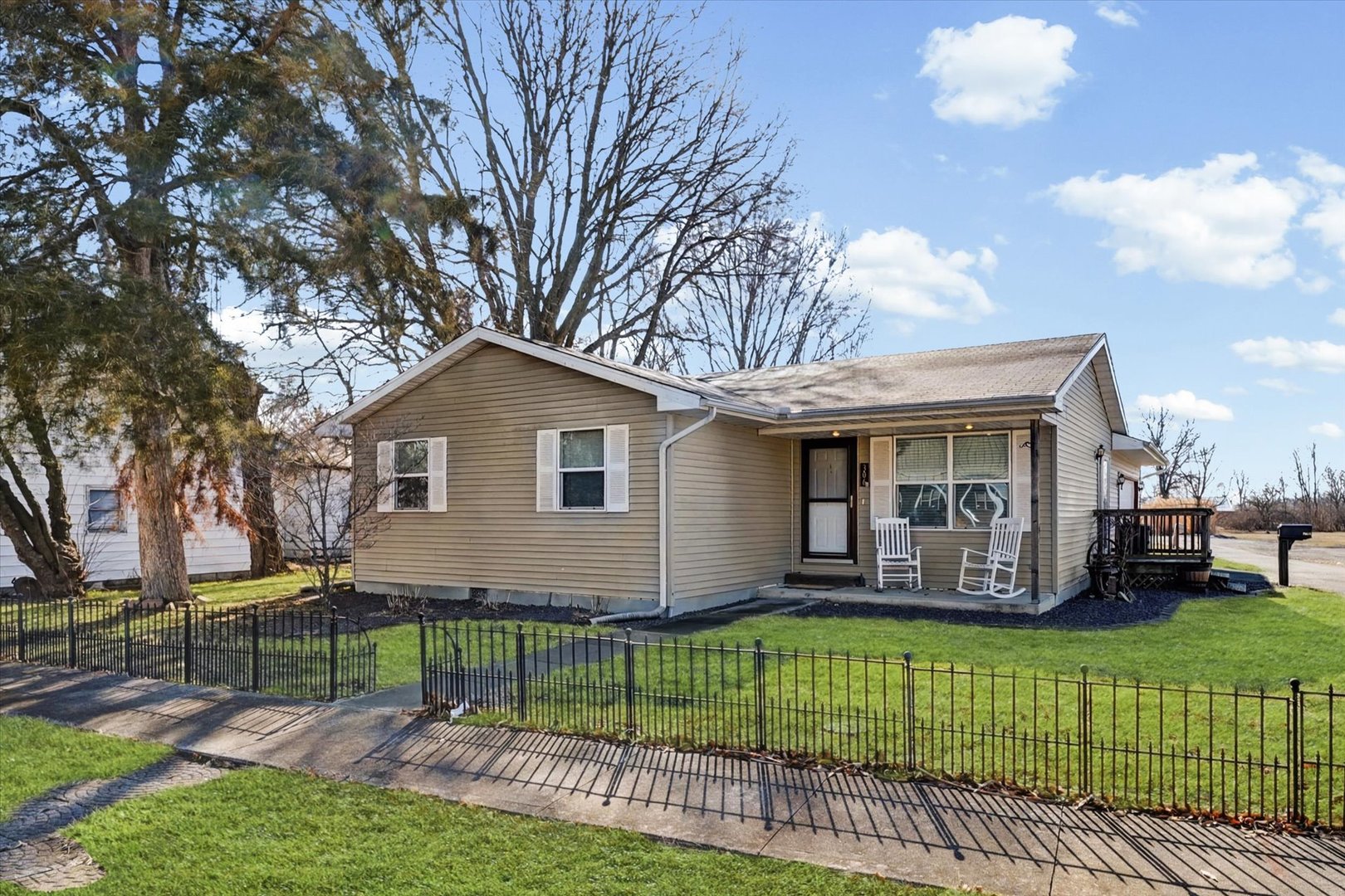 a view of a house with a yard