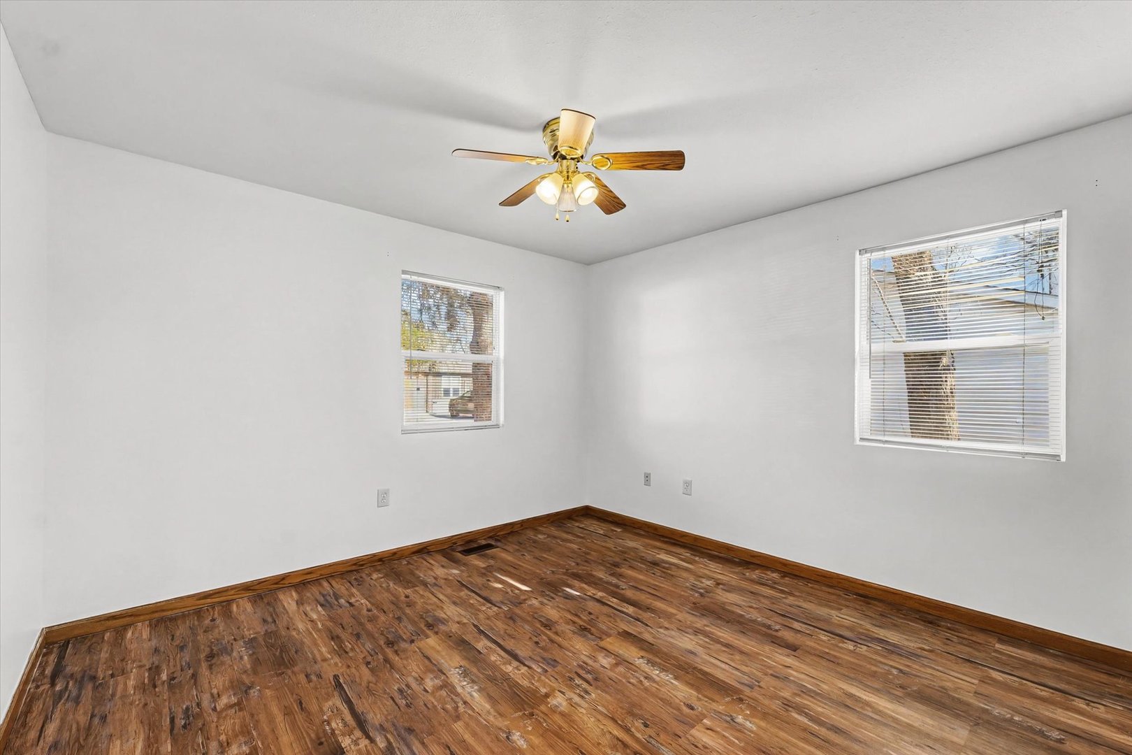 306 B W Lytle Street Newman, IL 61942 - Photo 17 of 47 a view of empty room with wooden floor