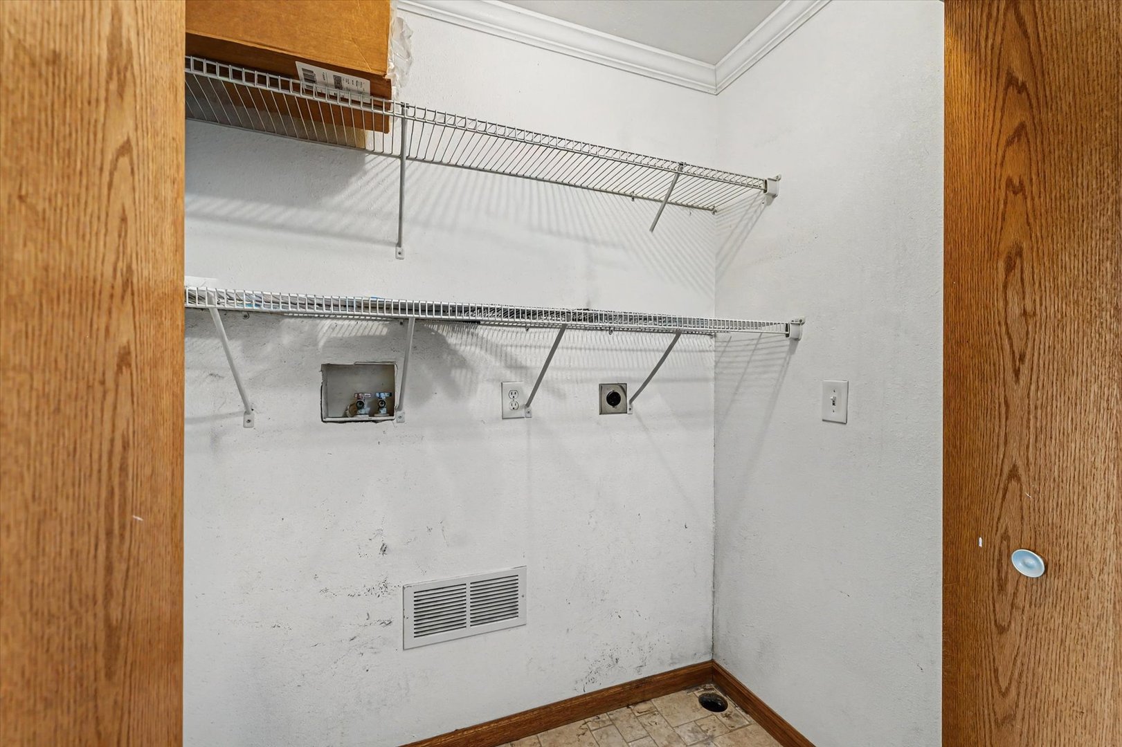 306 B W Lytle Street Newman, IL 61942 - Photo 22 of 47 a view of a room with rack on the wall