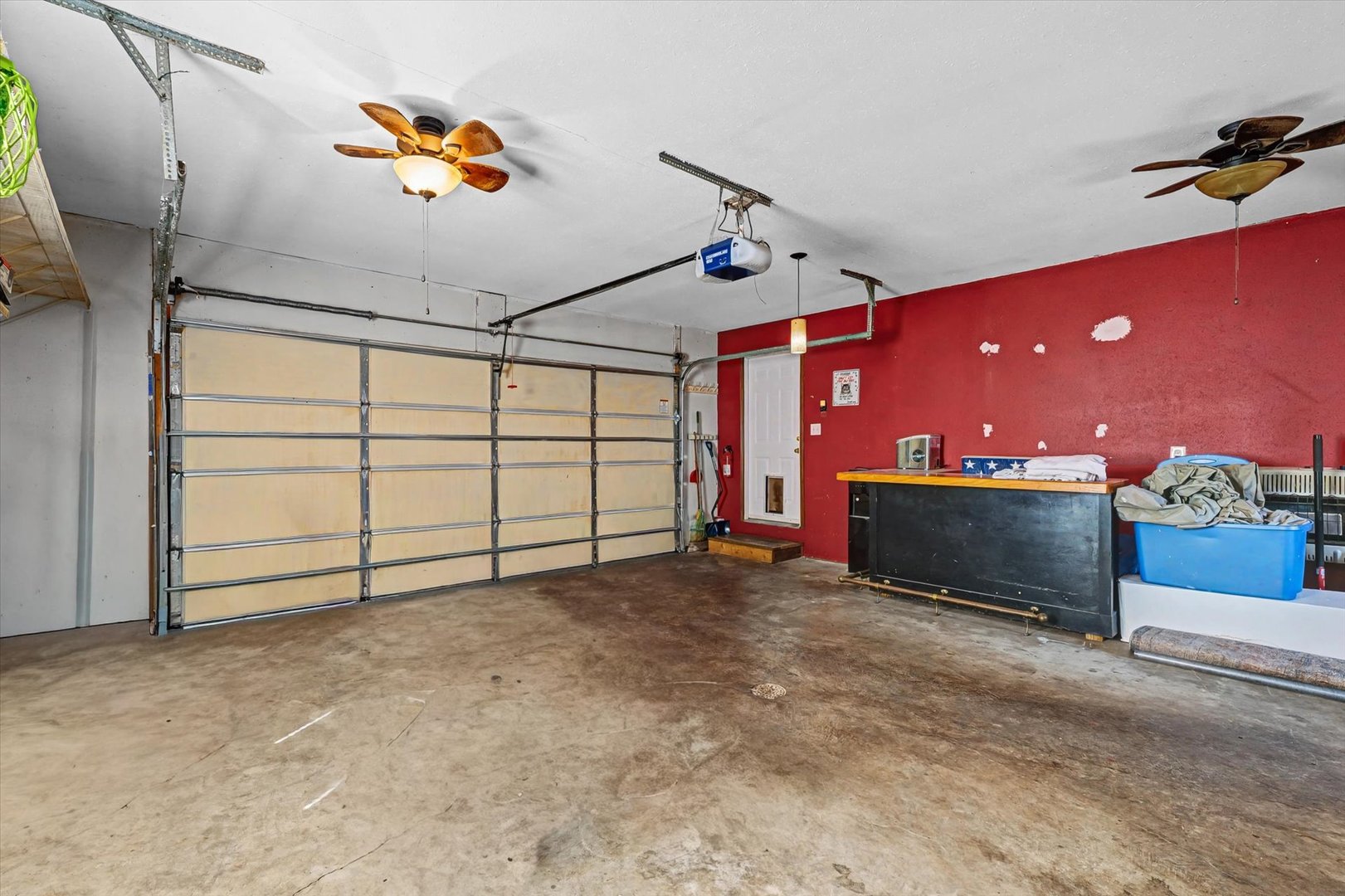 306 B W Lytle Street Newman, IL 61942 - Photo 23 of 47 a view of a indoor garage