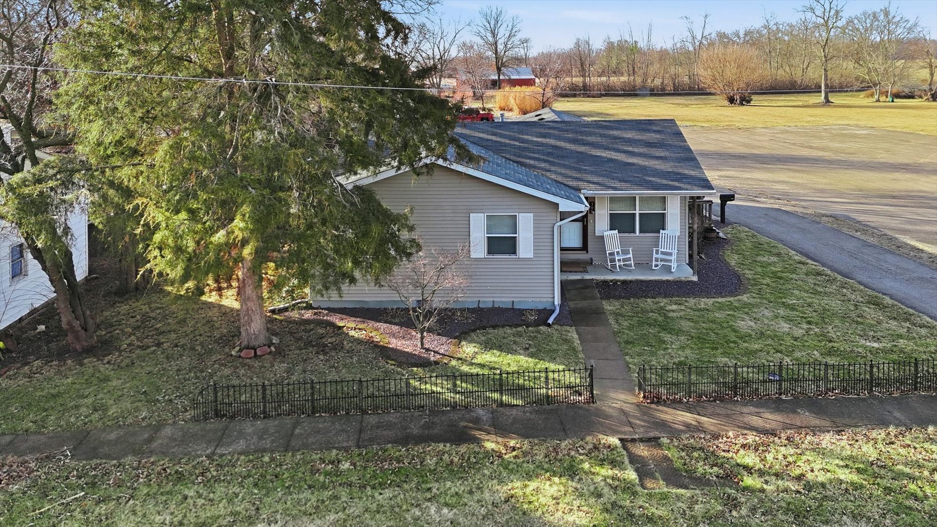 306 B W Lytle Street Newman, IL 61942 - Photo 43 of 47 a view of house with a yard