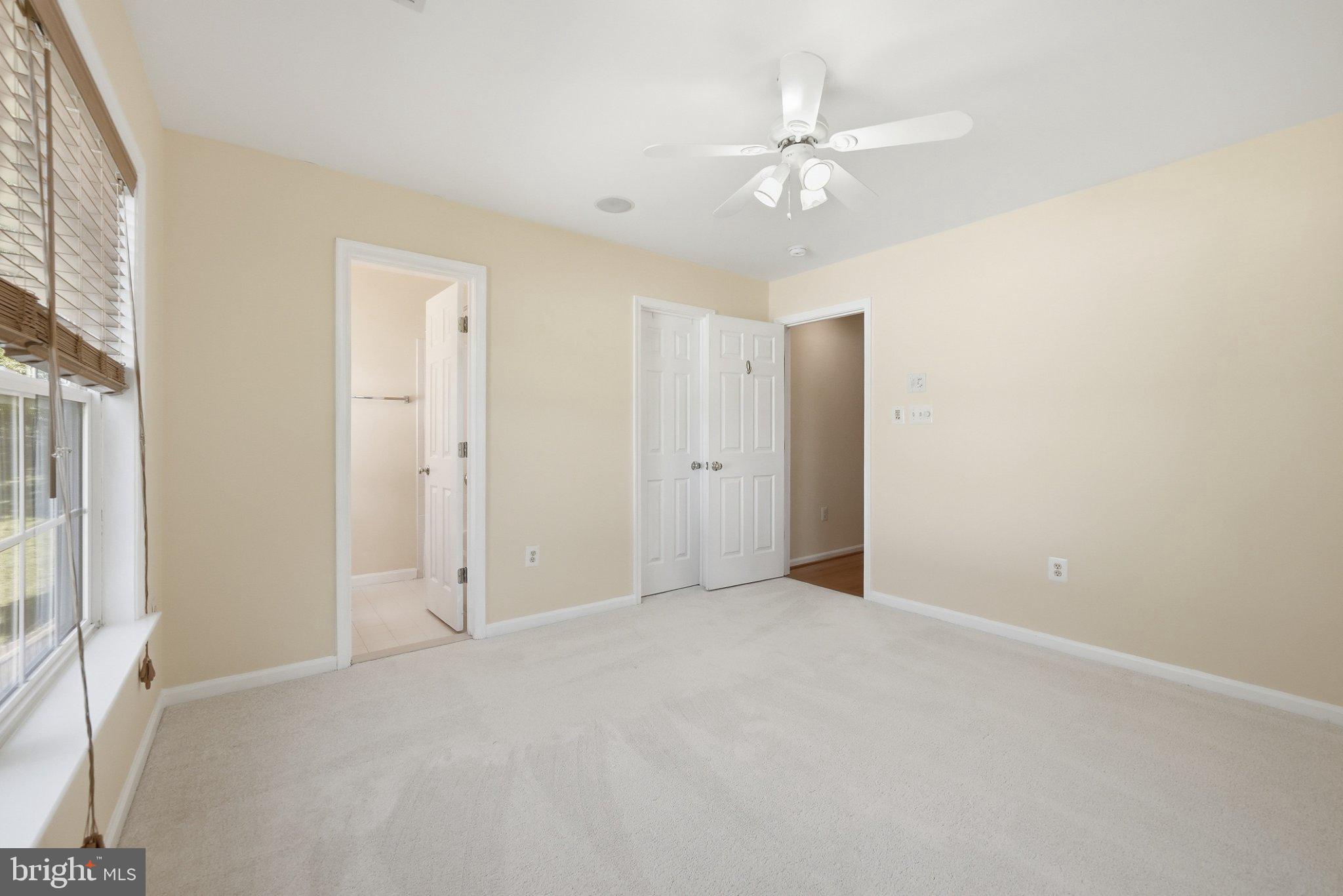 3679 Expedition Drive Triangle, VA 22172 - Photo 38 of 65 a view of an empty room with a ceiling fan
