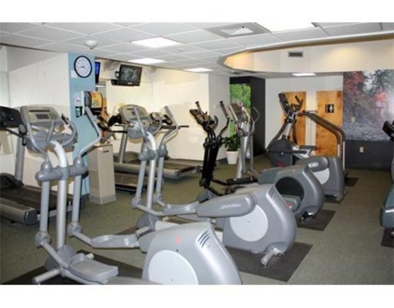 44 Washington Street, Unit 411 Brookline, MA 02445 - Photo 15 of 23 a view of a room with gym equipment