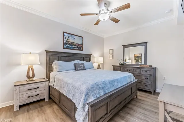 a bedroom with bed and window