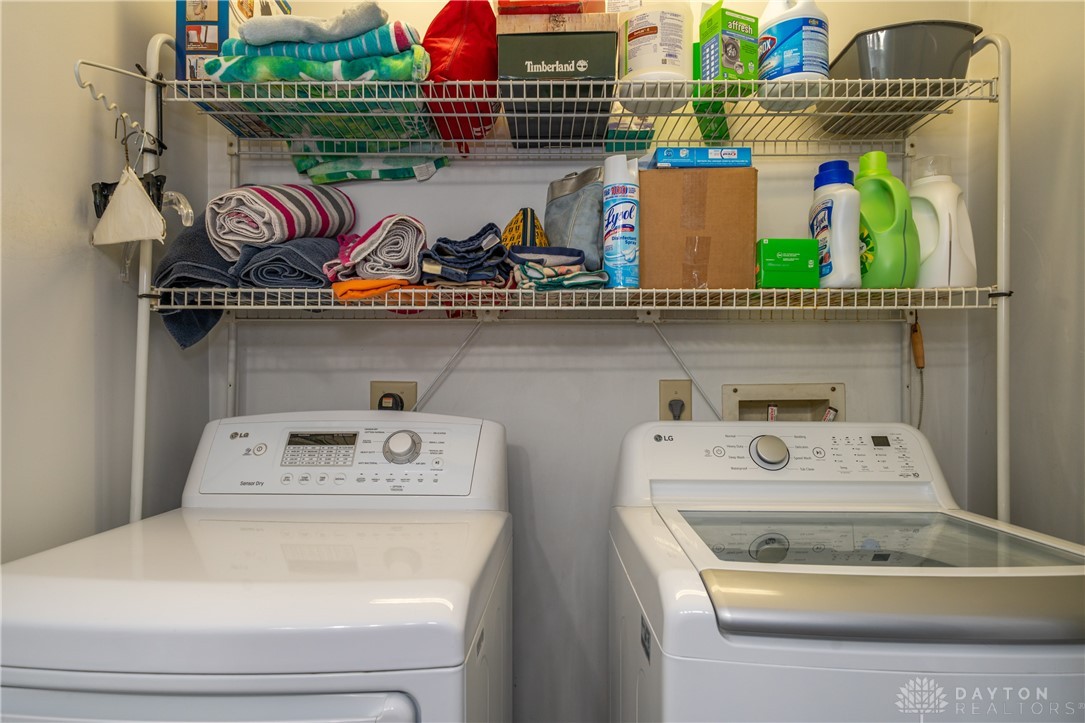 1599 Garringer Road Jamestown, OH 45335 - Photo 31 of 73 Functional laundry space with convenient shelving for effortless organization.