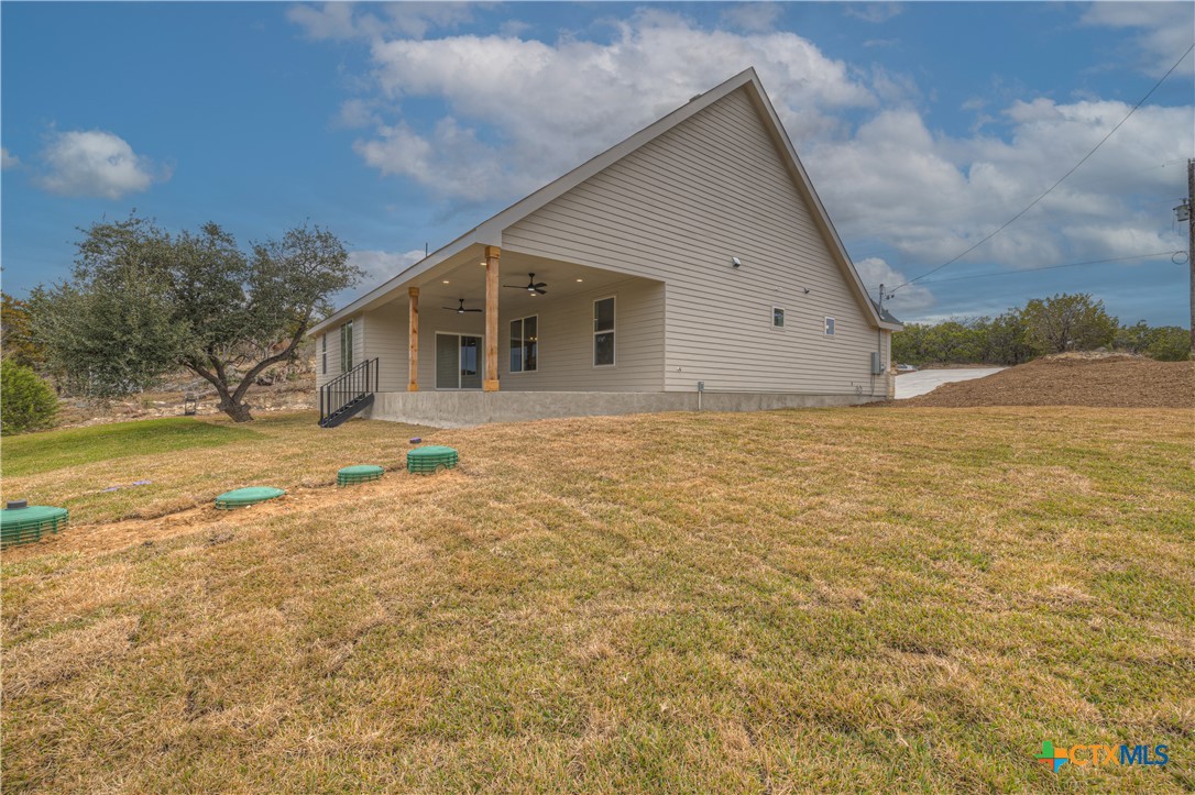328 Compass Rose Spring Branch, TX 78070 - Photo 45 of 48 a view of a house with a yard