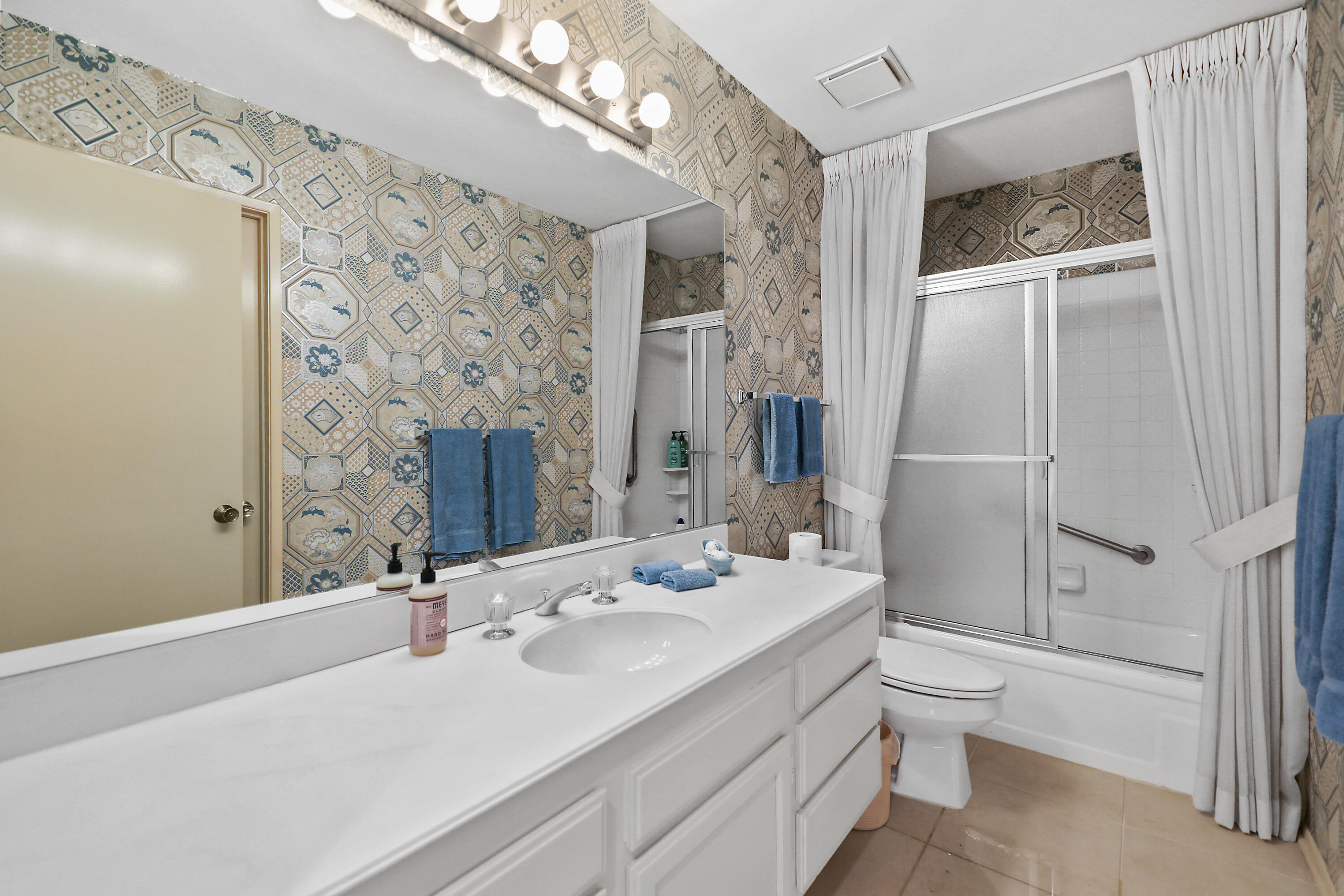 175 Gran Via Palm Desert, CA 92260 - Photo 19 of 36 a bathroom with a sink toilet and shower