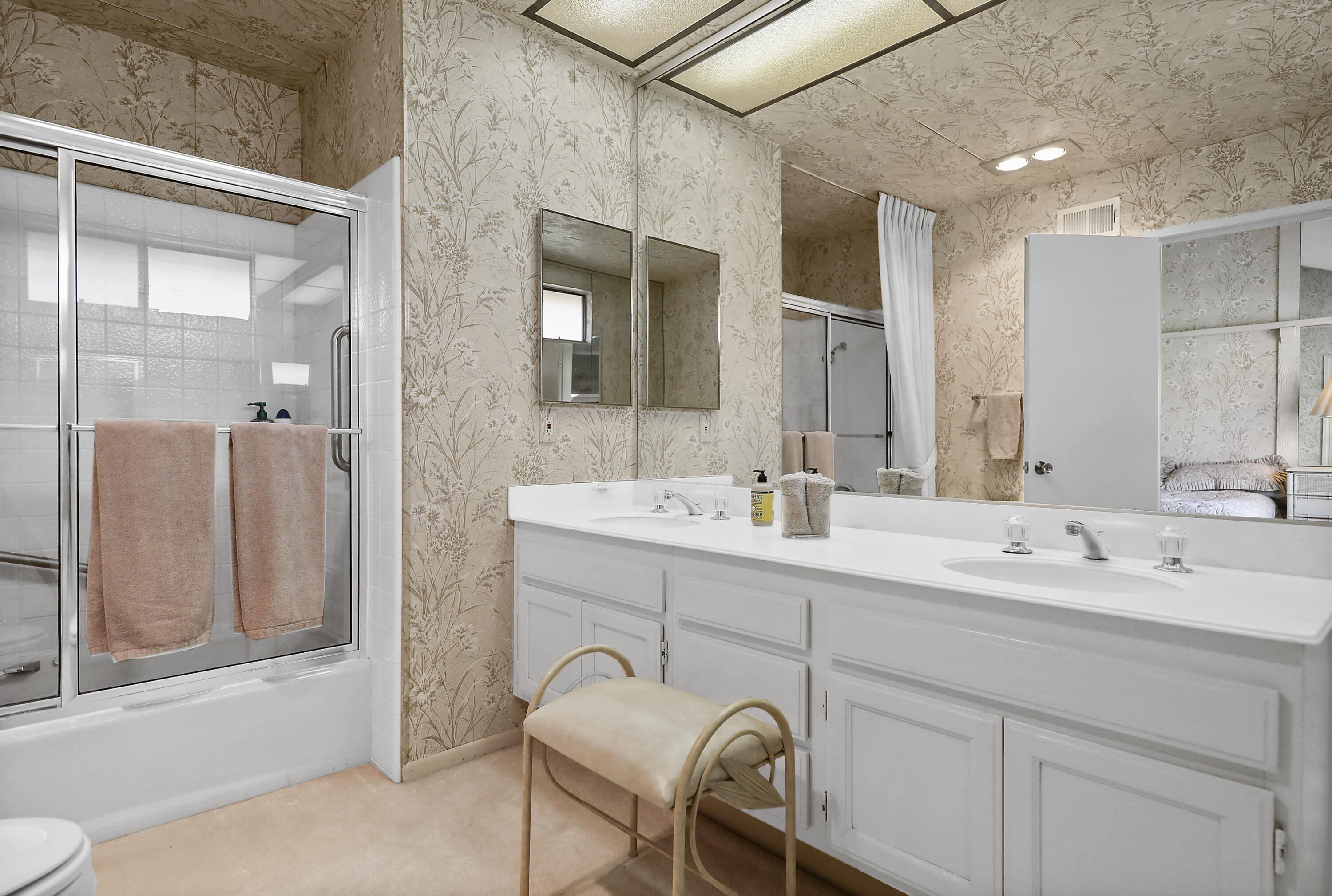 175 Gran Via Palm Desert, CA 92260 - Photo 22 of 36 a spacious bathroom with a double vanity sink mirror and shower