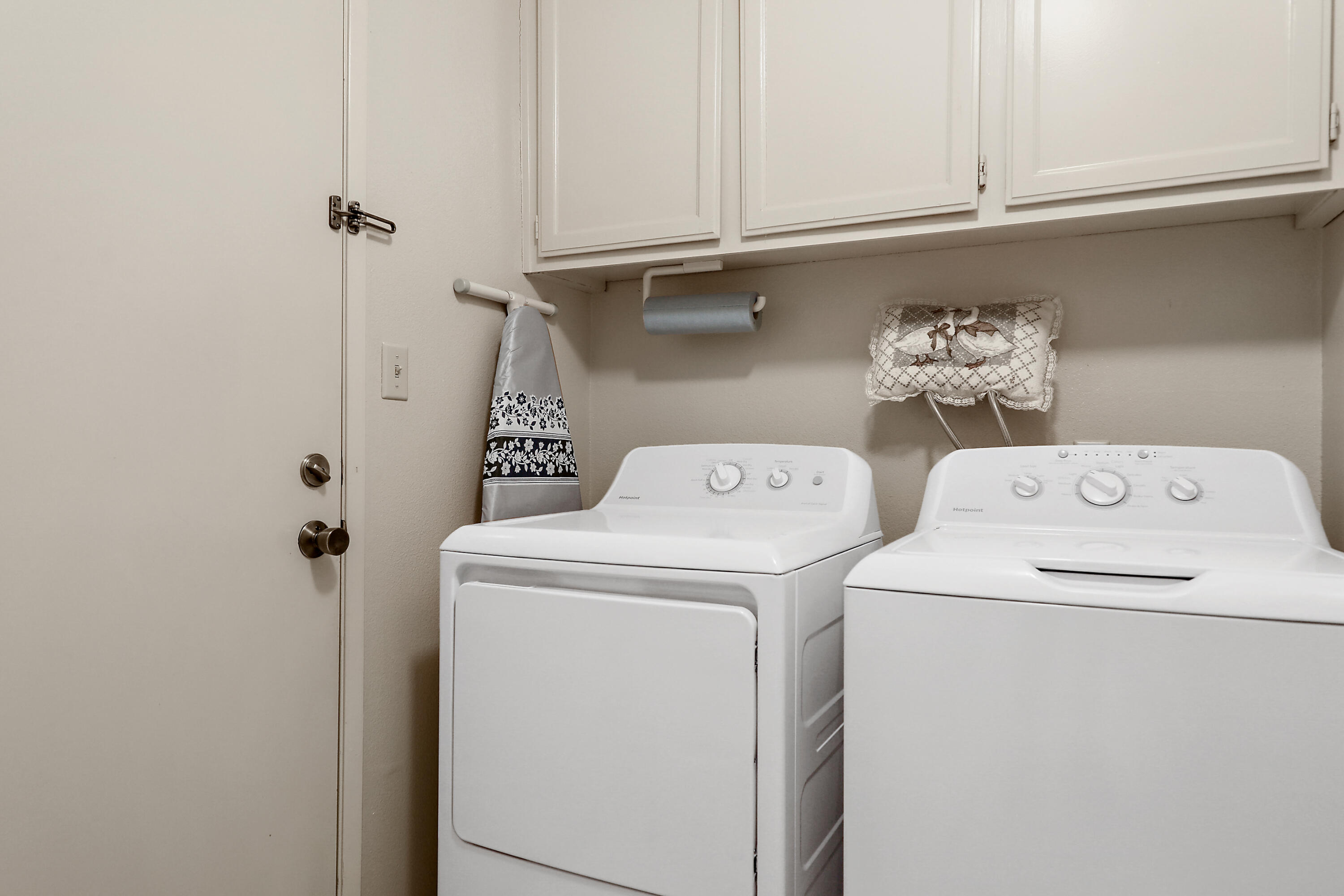175 Gran Via Palm Desert, CA 92260 - Photo 23 of 36 a utility room with dryer and washer