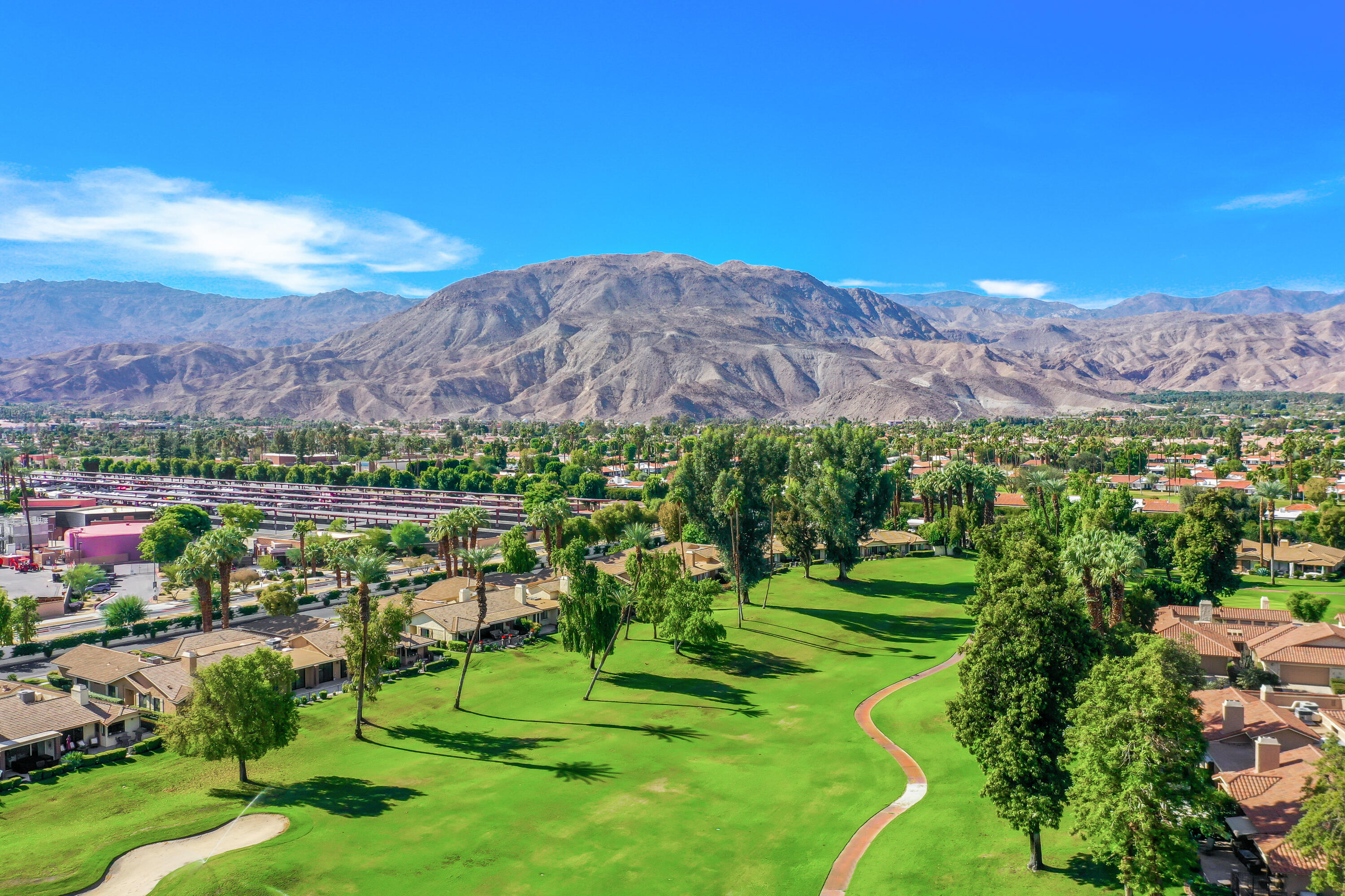 175 Gran Via Palm Desert, CA 92260 - Photo 32 of 36 a view of a city with a mountain in the background
