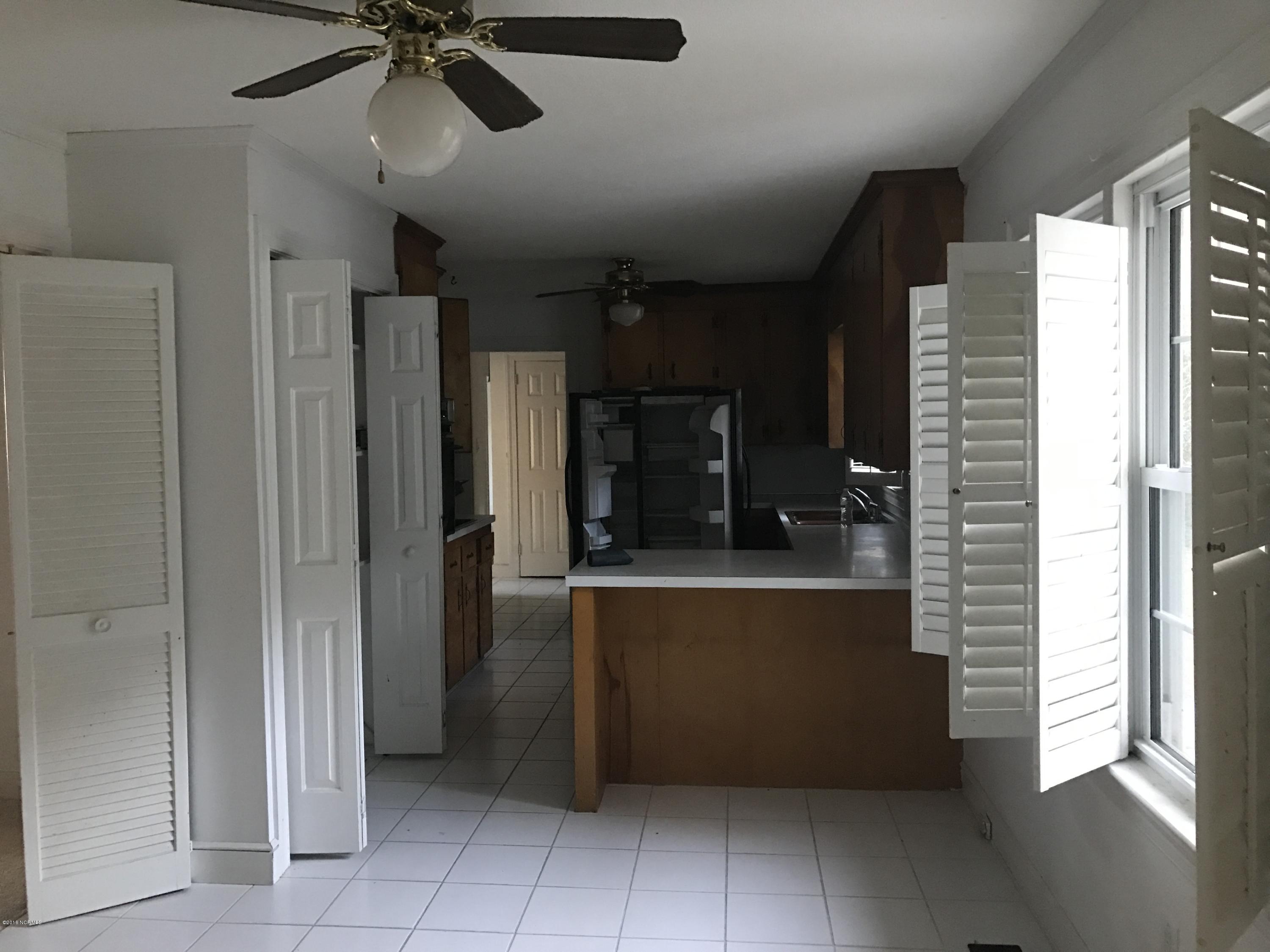 1752 Holly Ridge Road Kinston, NC 28504 - Photo 3 of 10 Kitchen with dining area