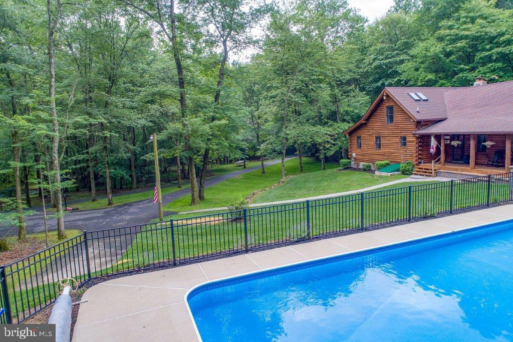 691 McKinneytown Road Elkton, MD 21921 - Photo 65 of 76 Concrete apron surrounds pool